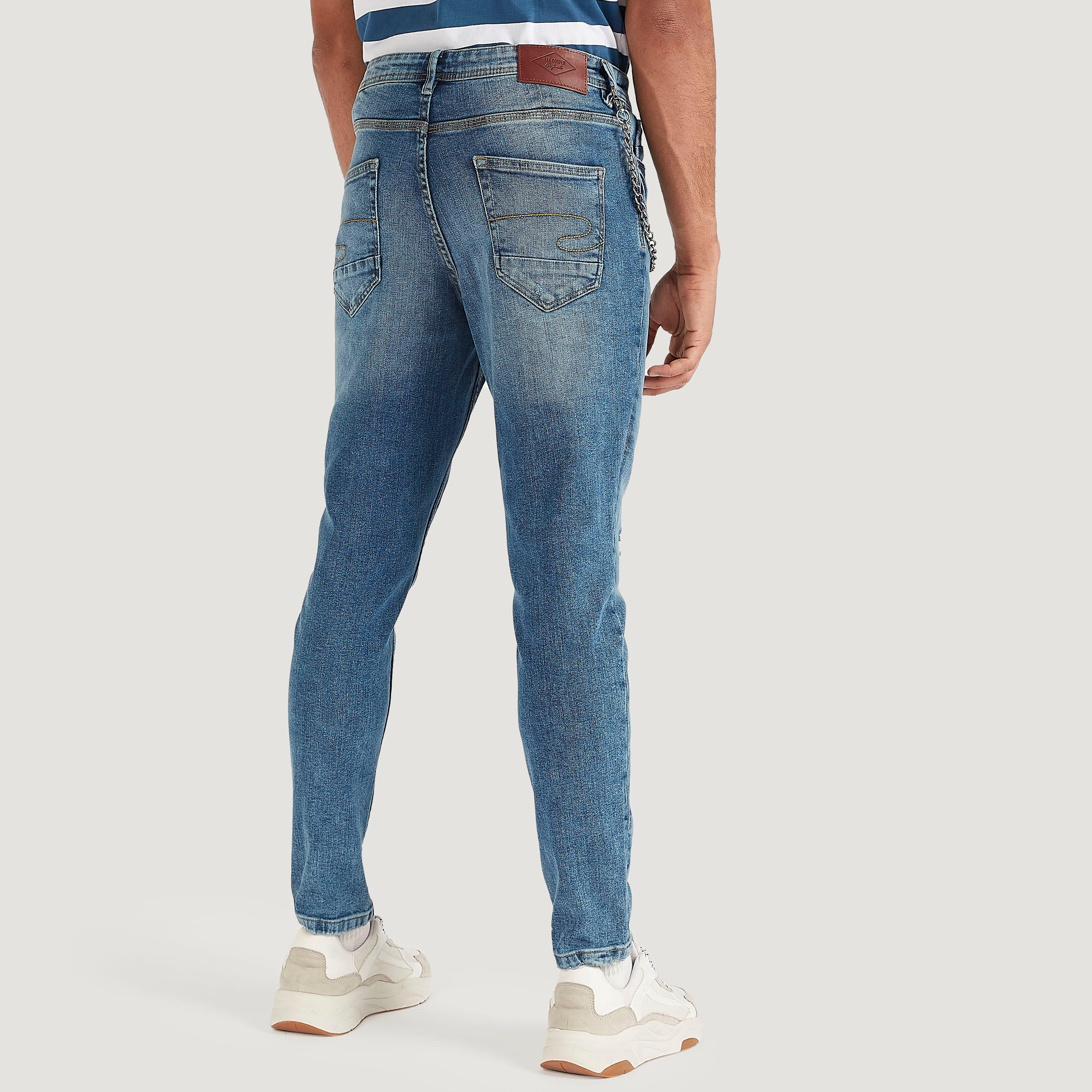 بنطلون جينز مضلّع كاروت فيت بخصر منخفض من لي كوبر-men-clothing-bottoms-jeans-image-4