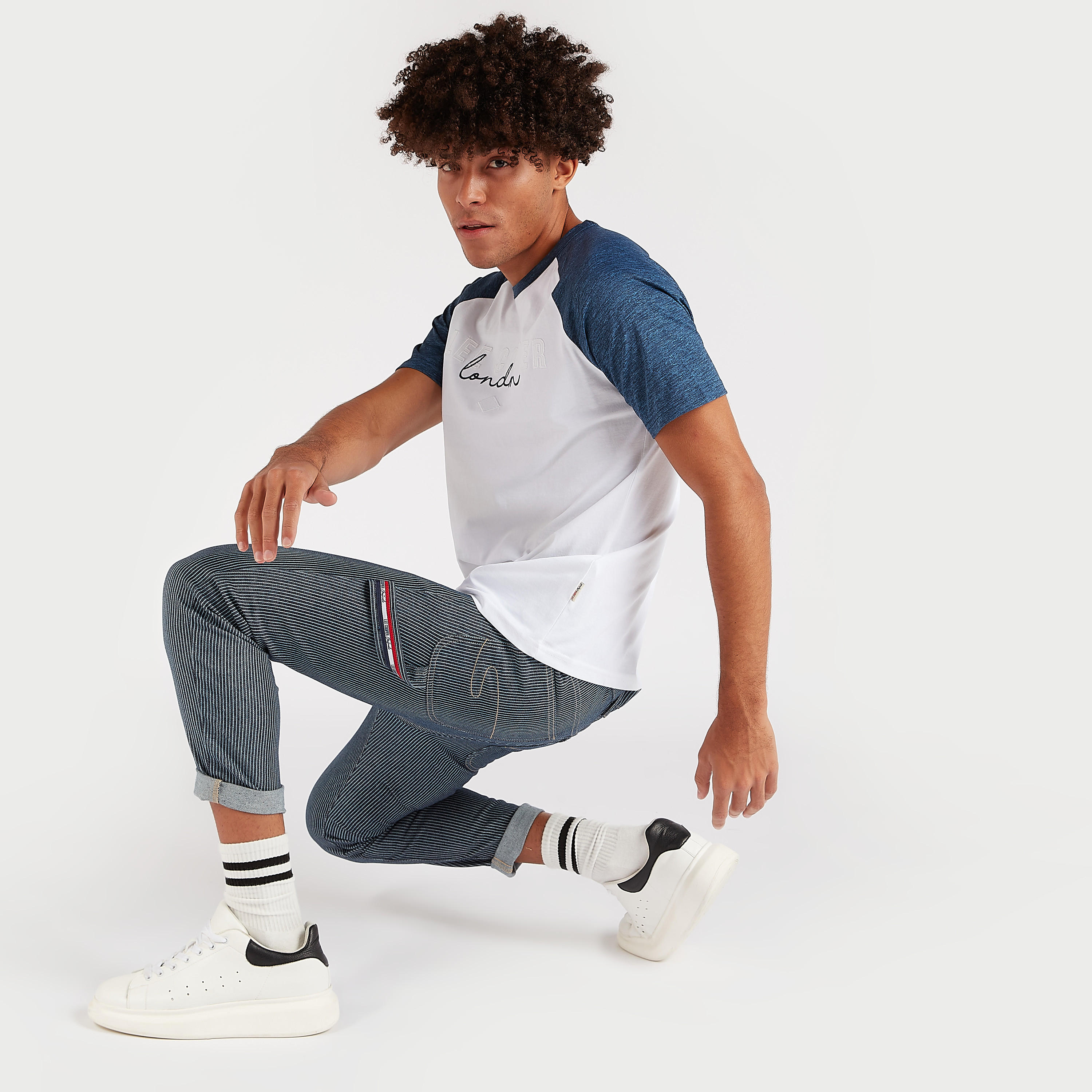 بنطلون جينز دنيم مخطط بقصّة جزرة بخصر متوسّط الارتفاع من لي كوبر-men-clothing-bottoms-jeans-image-2