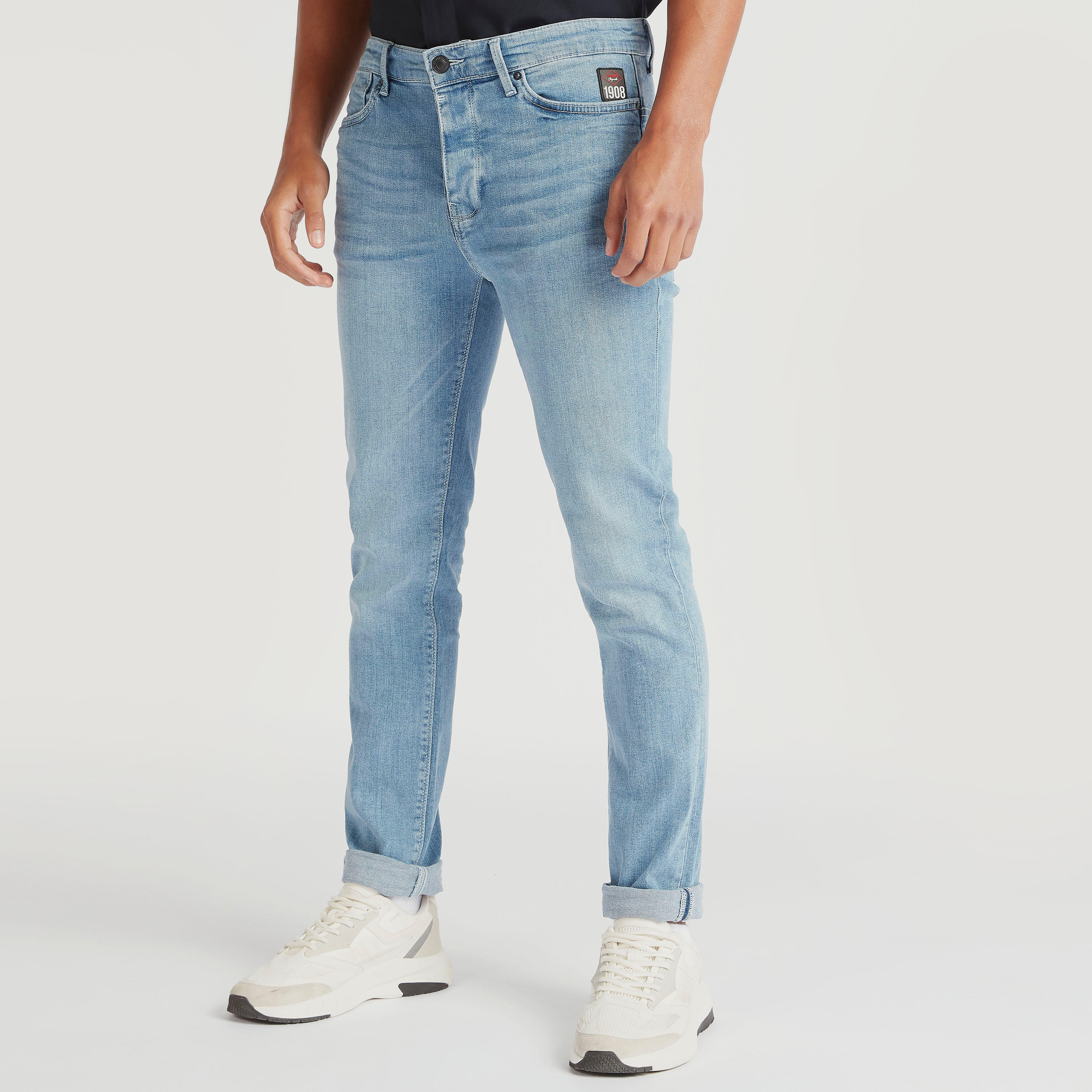 بنطلون جينز سادة بقصّة سكيني وجيوب من لي كوبر-men-clothing-bottoms-jeans-image-1