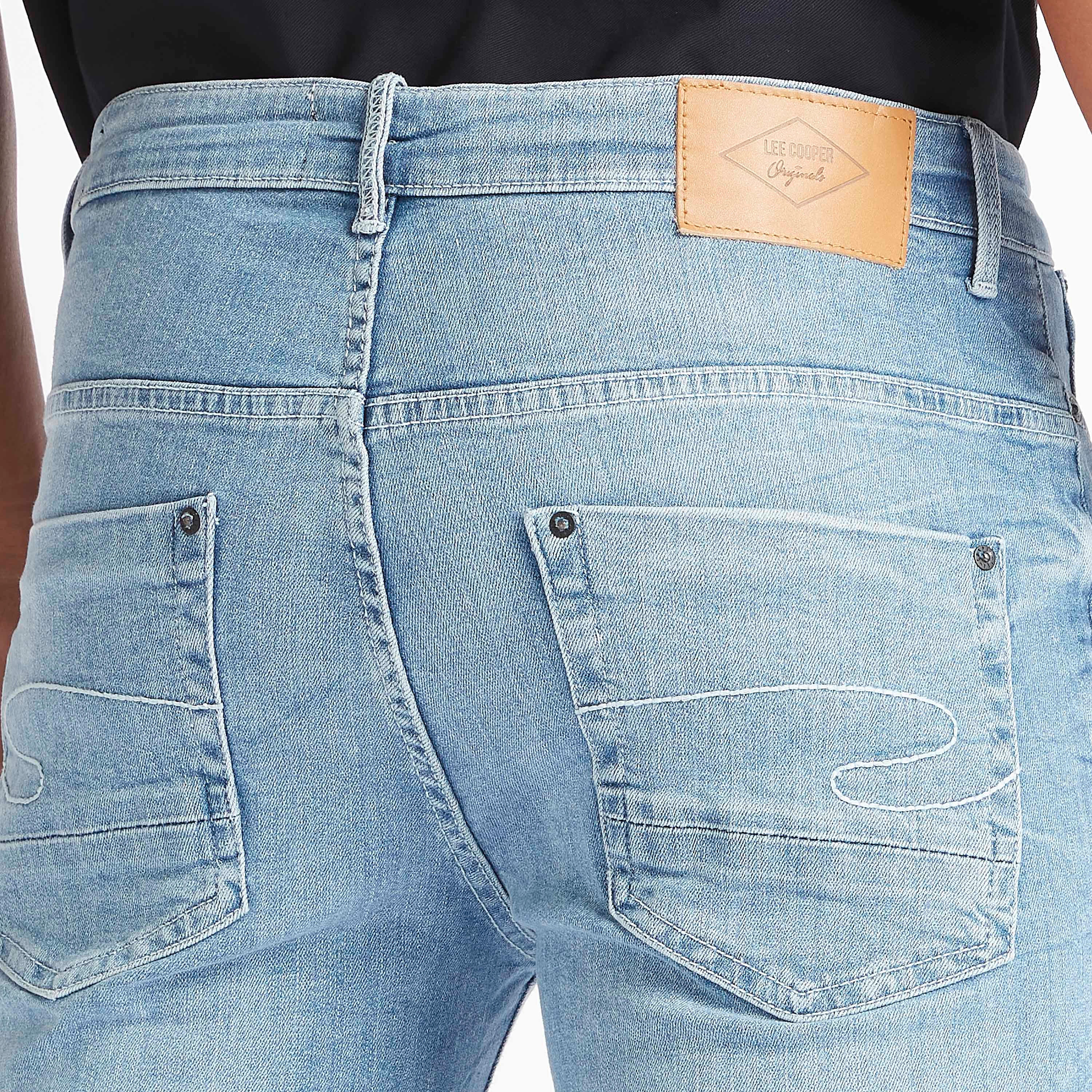 بنطلون جينز سادة بقصّة سكيني وجيوب من لي كوبر-men-clothing-bottoms-jeans-image-5