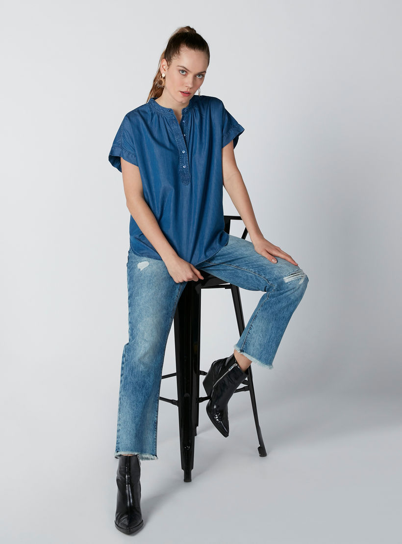 بنطال جينز ممّزق بقصّة عاديّة وجيوب-women-clothing-bottoms-jeans-image-1