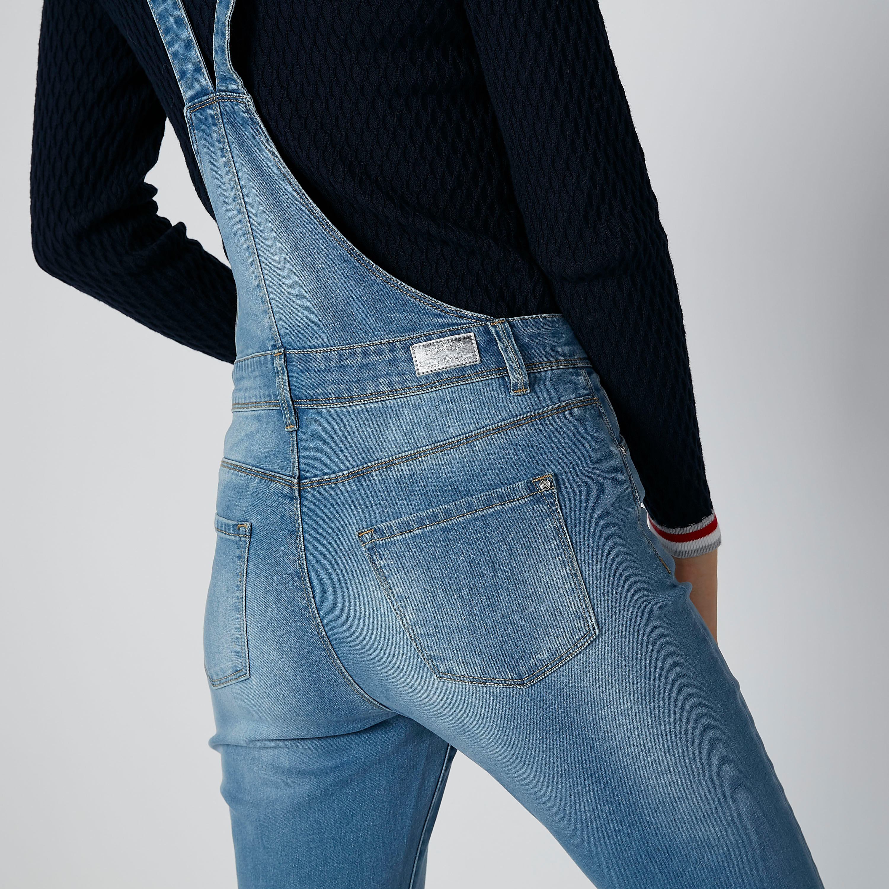 دنغري مستدام بخصر متوسط الارتفاع وجيوب -women-clothing-bottoms-jeans-image-6