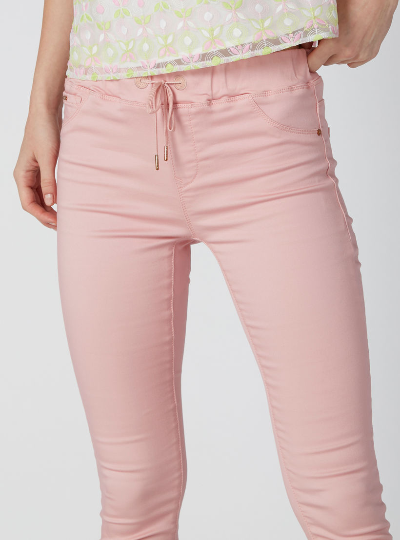 بنطال جينز بقصة سكيني ورباط وجيوب-women-clothing-bottoms-jeans-image-5