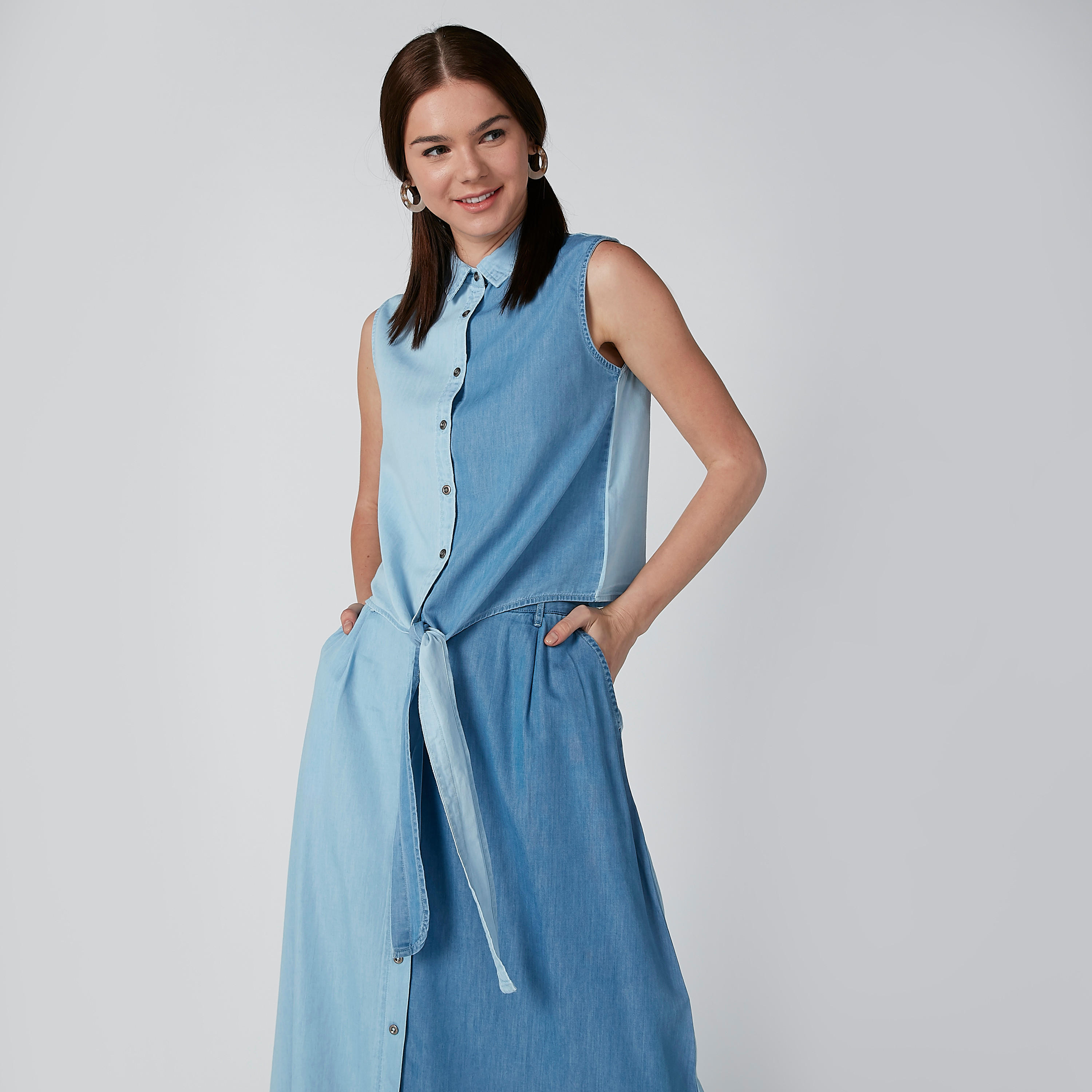 قميص سادة دون أكمام مزيّن بعقدة-women-clothing-shirtsandblouses-shirts-image-1