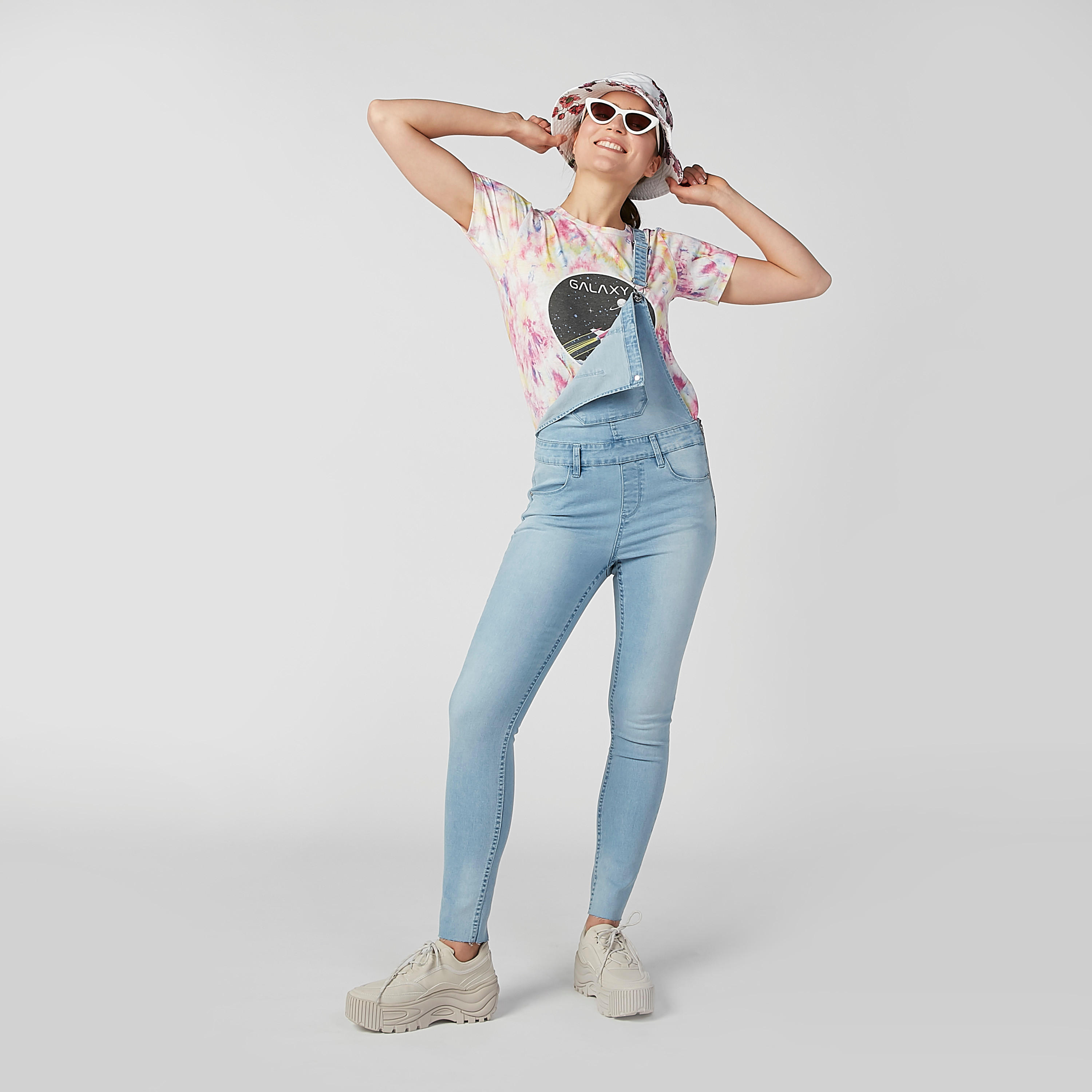 دنغري مستدام سكيني بخصر متوسط الارتفاع وجيوب-women-clothing-jumpsuits-image-1