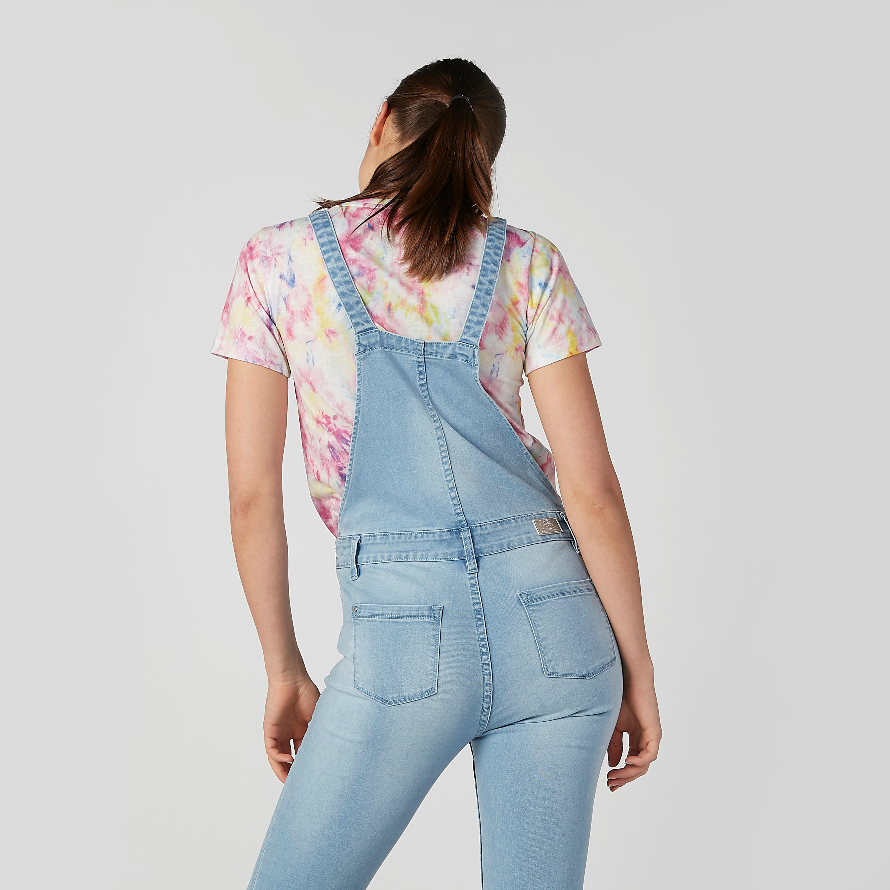 دنغري مستدام سكيني بخصر متوسط الارتفاع وجيوب-women-clothing-jumpsuits-image-5