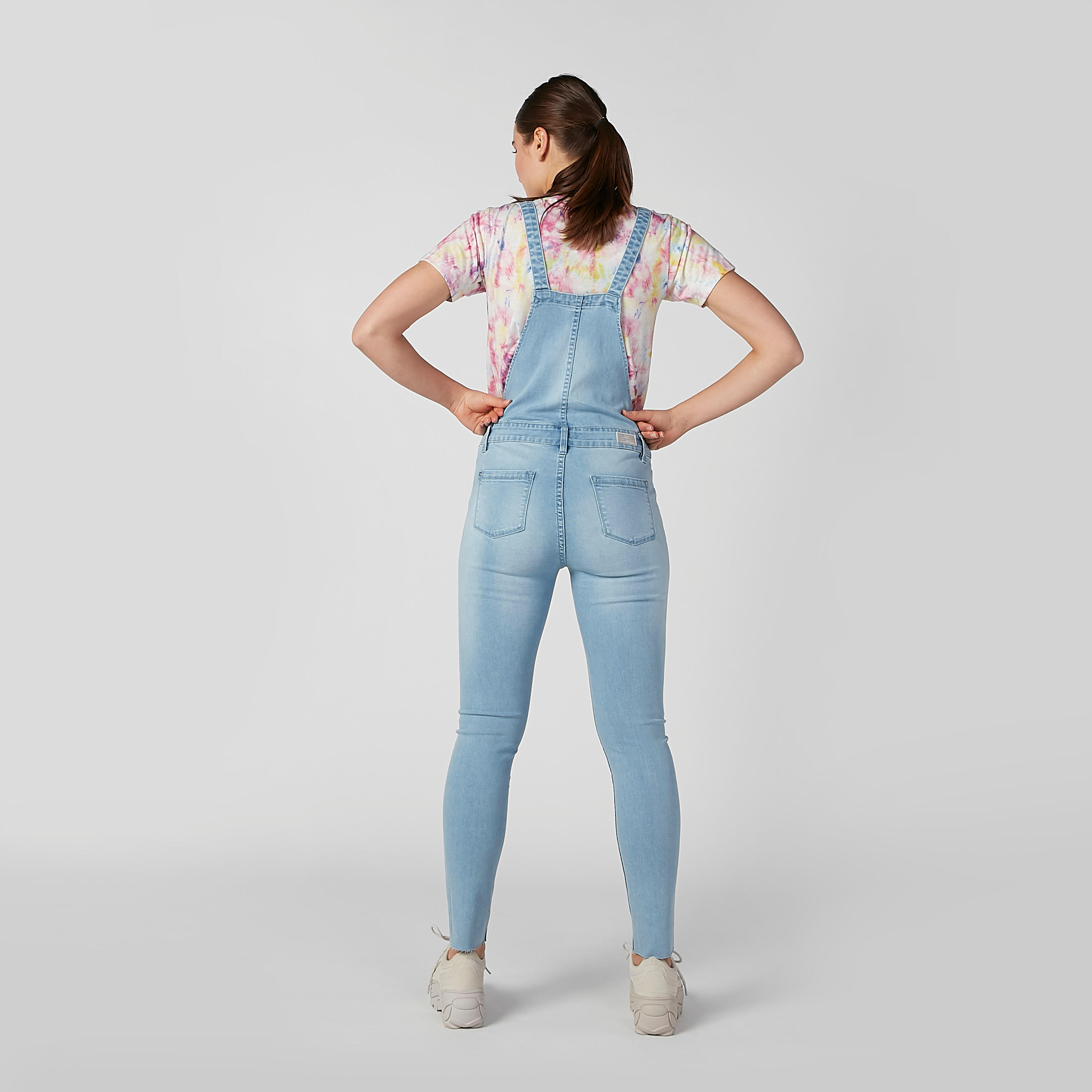 دنغري مستدام سكيني بخصر متوسط الارتفاع وجيوب-women-clothing-jumpsuits-image-6