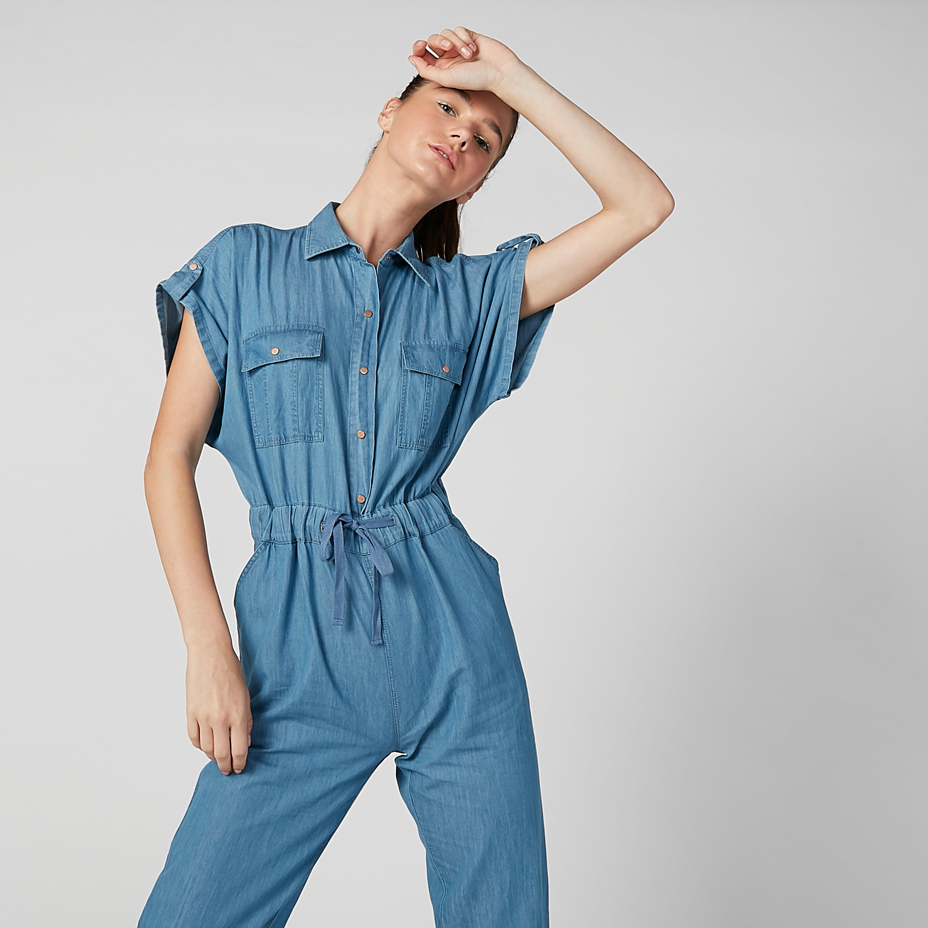 أفرول مستدام دينم سكيني بأكمام متصلة وجيوب -women-clothing-jumpsuits-image-3