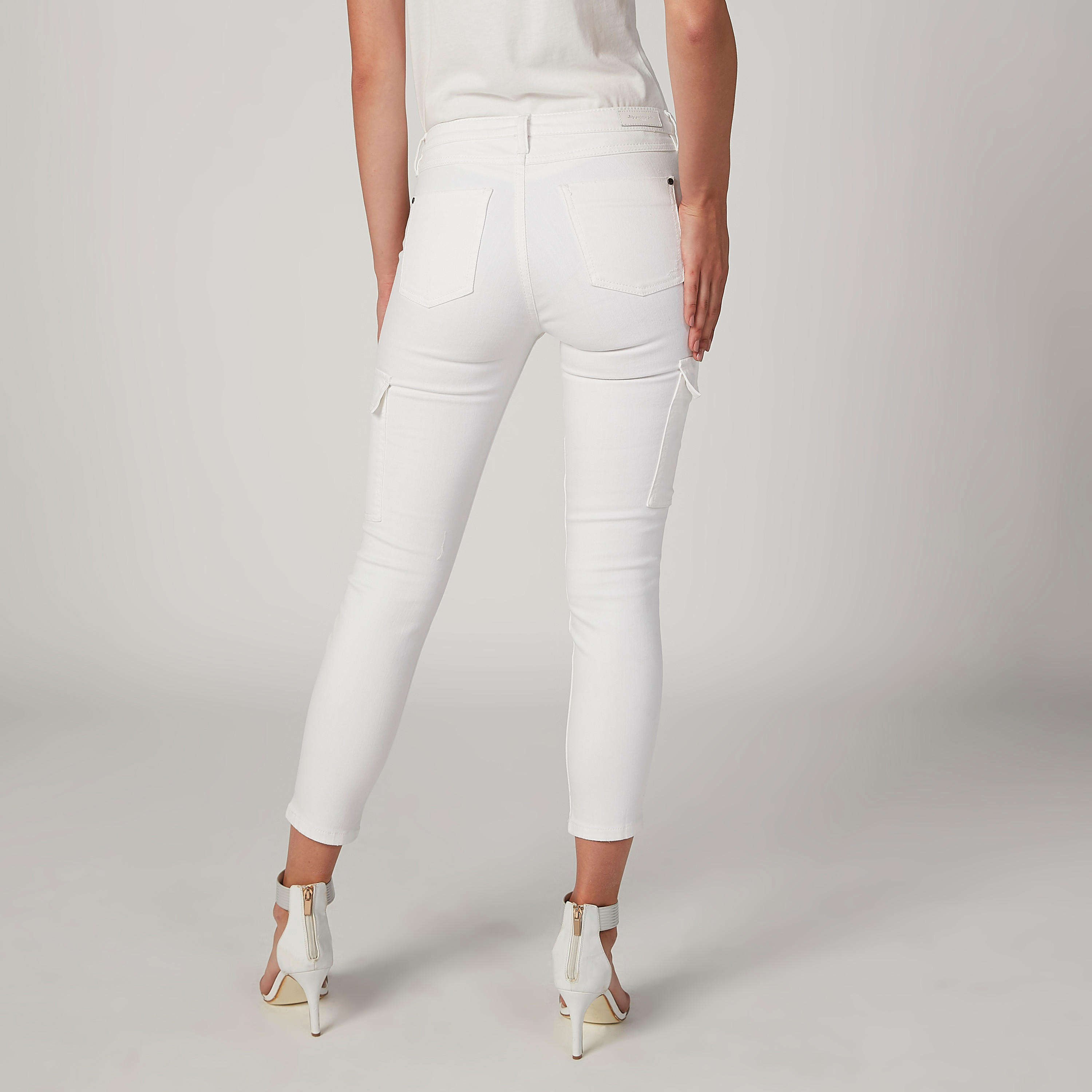 بنطلون جينز مستدام سكيني ممزّق بخصر متوسط الارتفاع وجيوب -women-clothing-bottoms-jeans-image-4