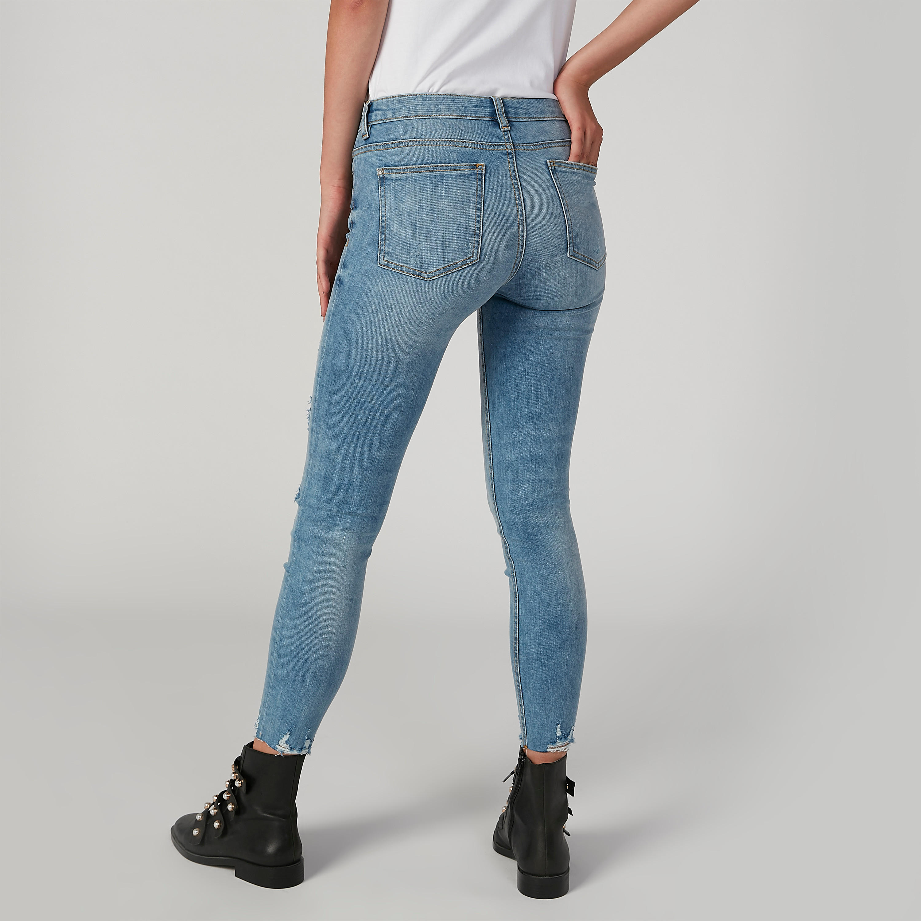 بنطلون جينز مستدام سكيني ممزّق بخصر متوسط الارتفاع وجيوب -women-clothing-bottoms-jeans-image-4