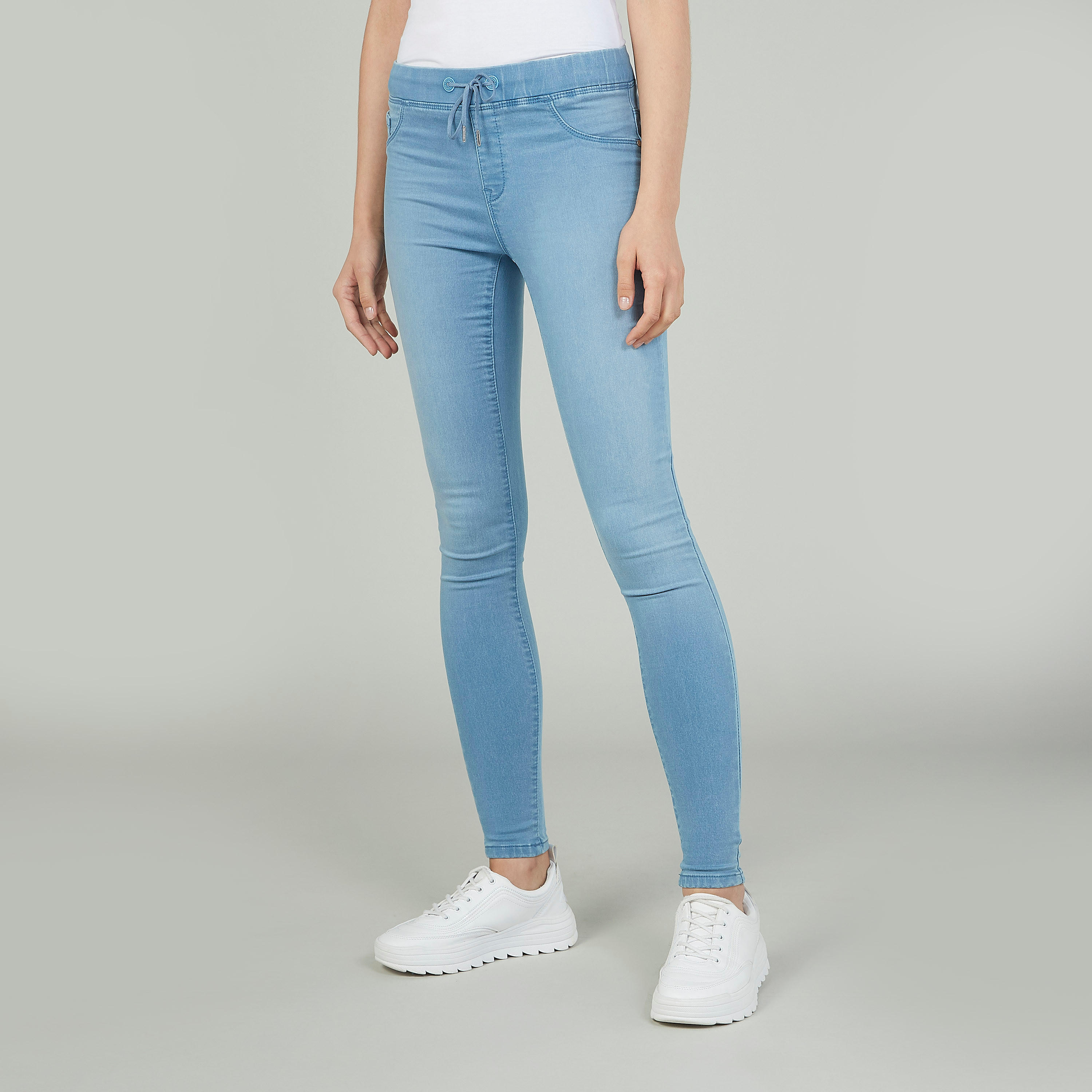 بنطلون ليقنز سادة بخصر مطاطي وتفاصيل جيوب-women-clothing-bottoms-jeans-image-1