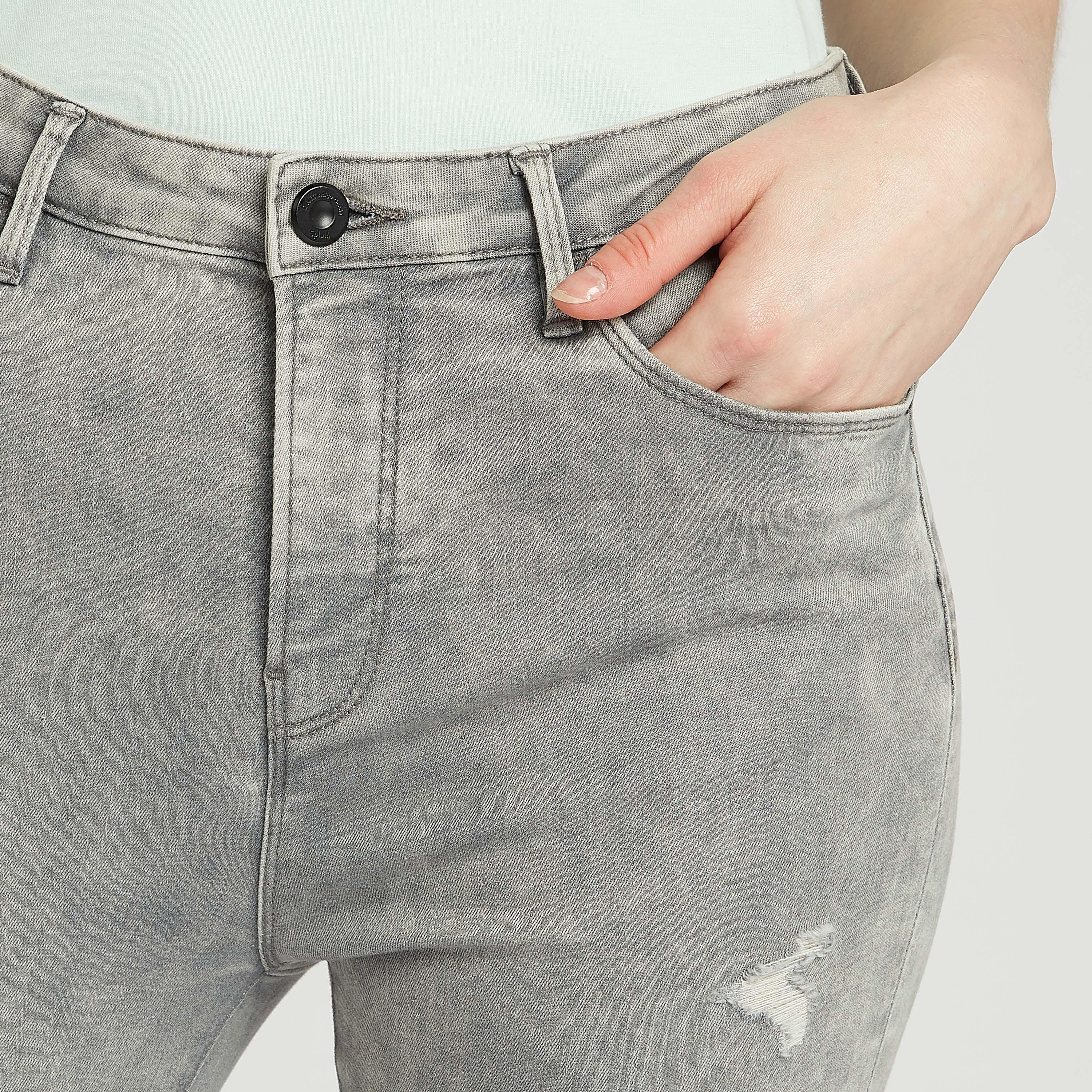 بنطلون جينز ممزّق بجيوب وعراوي-women-clothing-bottoms-jeans-image-3