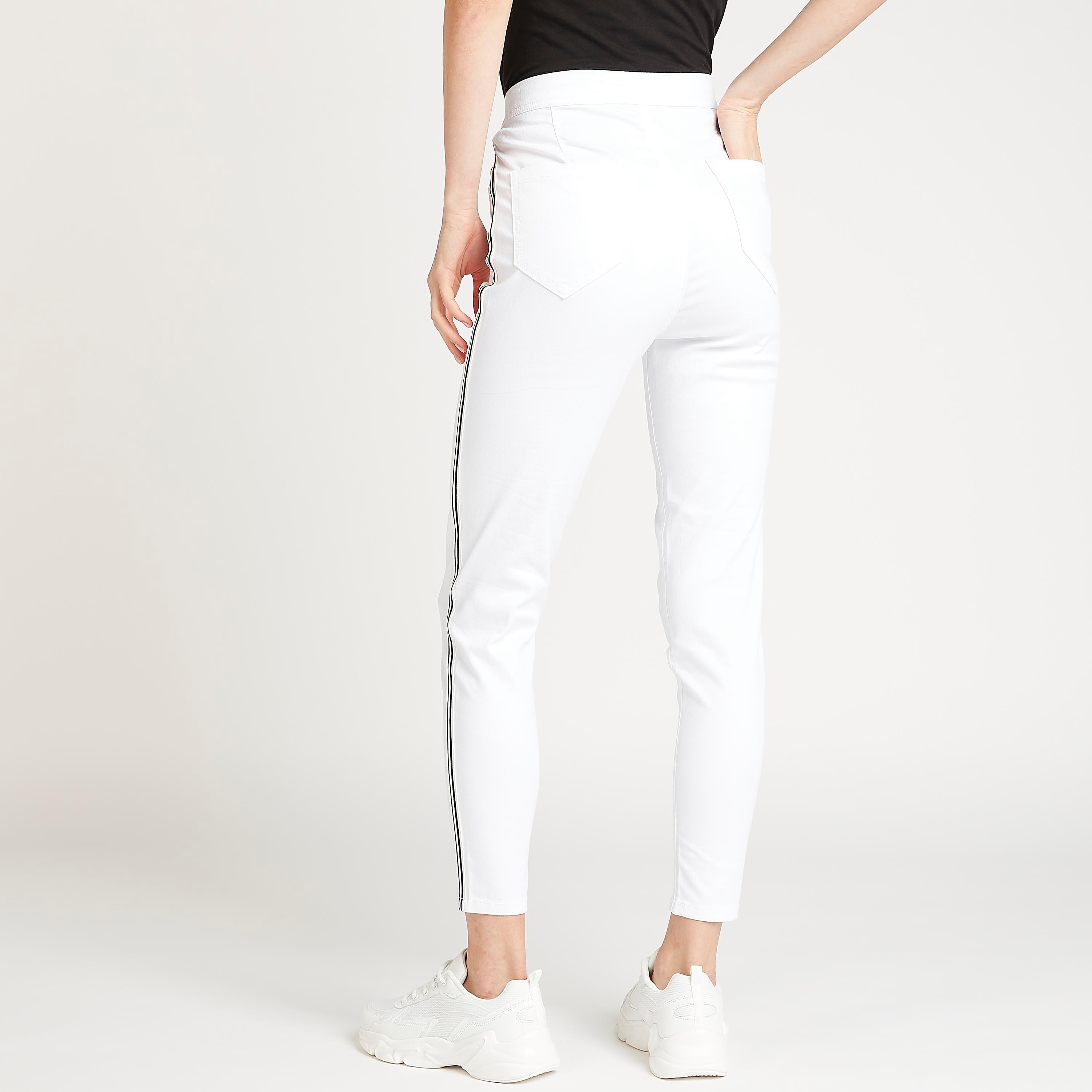 بنطلون دينم سادة بقصّة ضيّقة وتفاصيل شريطة-women-clothing-bottoms-leggings-image-4