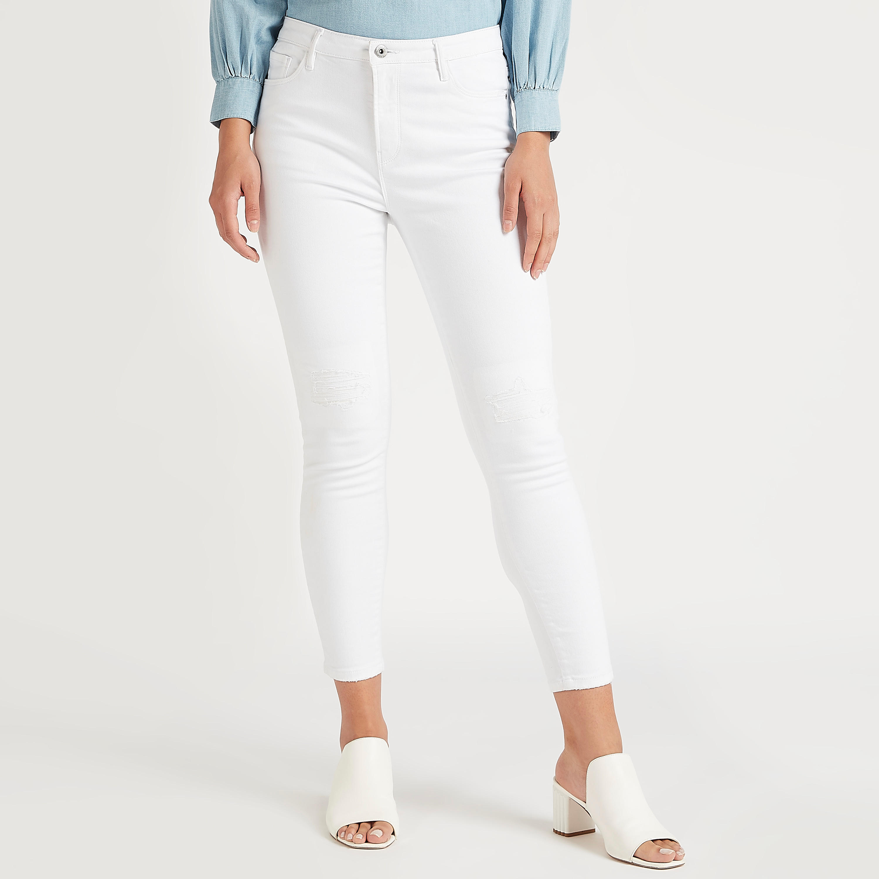 بنطلون جينز دنيم سادة سكيني فيت بزر إغلاق وجيوب-women-clothing-bottoms-jeans-image-1