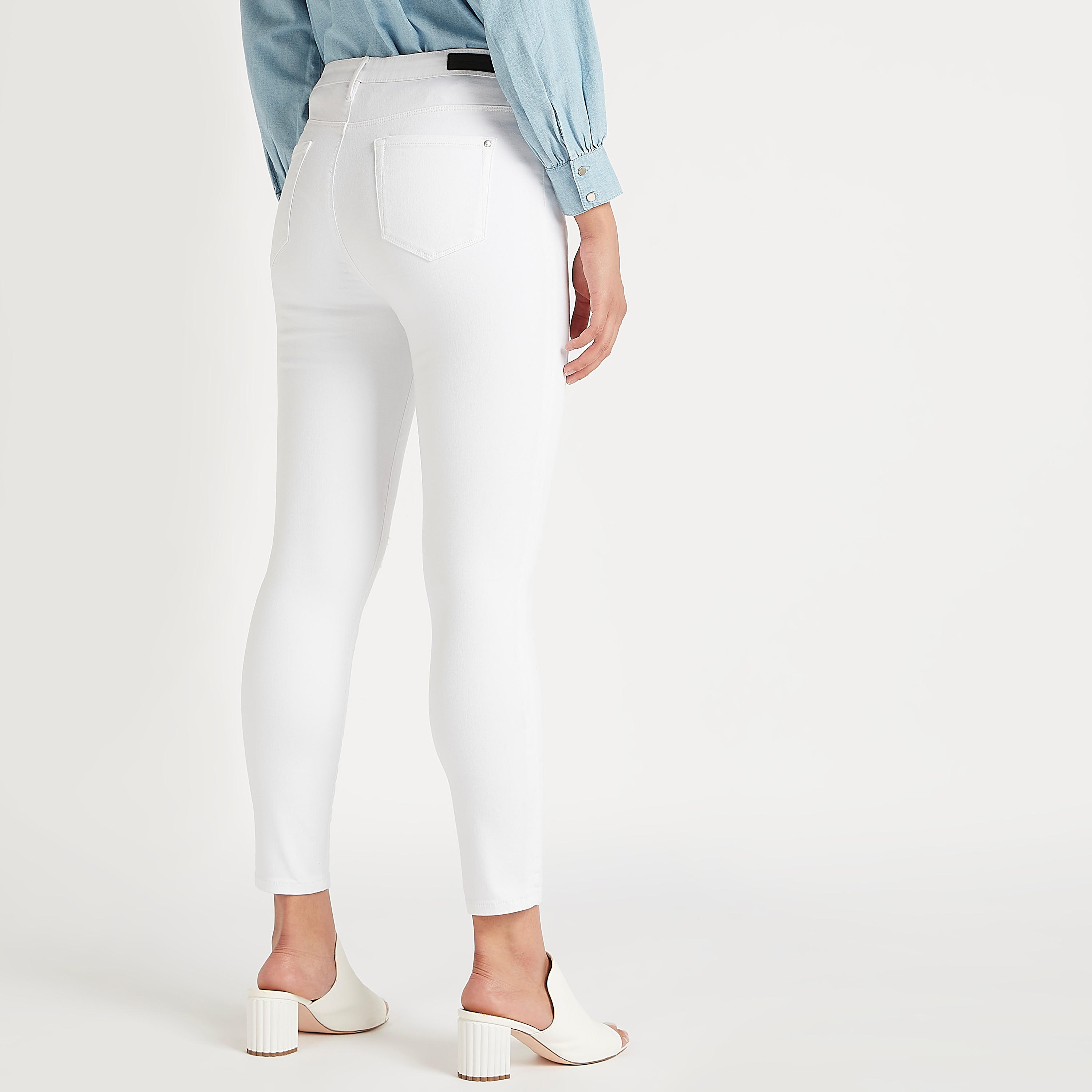 بنطلون جينز دنيم سادة سكيني فيت بزر إغلاق وجيوب-women-clothing-bottoms-jeans-image-4