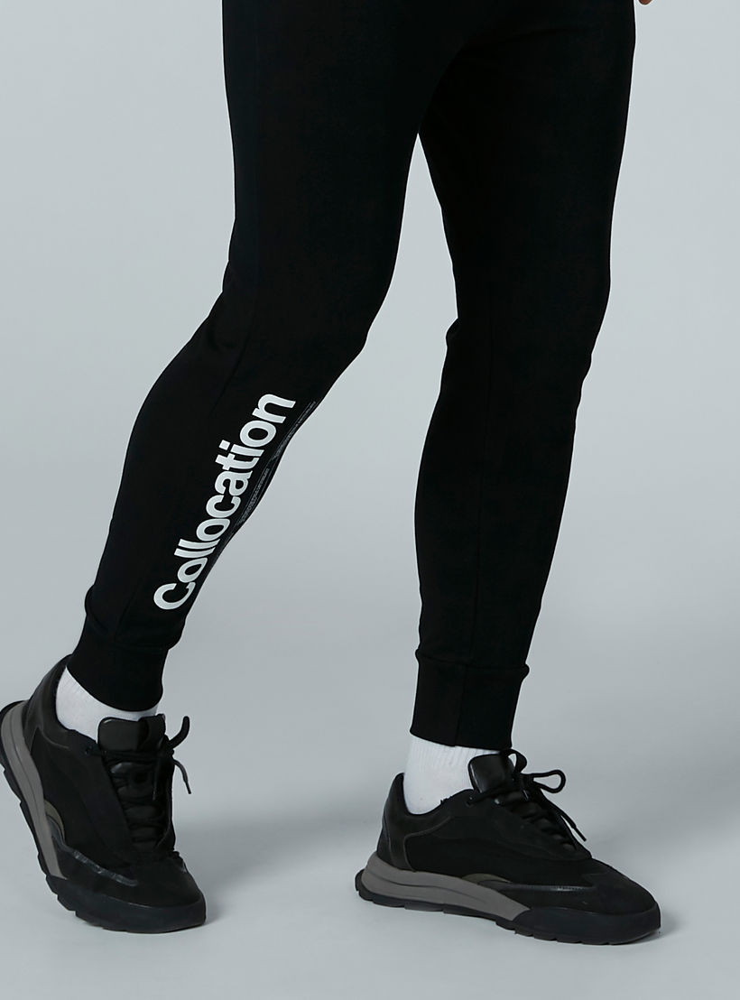بنطال رياضي طويل بجيوب وطبعات-men-clothing-bottoms-joggers-image-4
