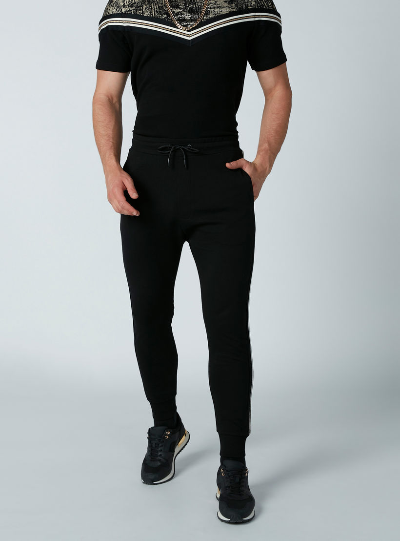 بنطال رياضي بقصّة سليم ورباط وشريطة-men-clothing-bottoms-joggers-image-3