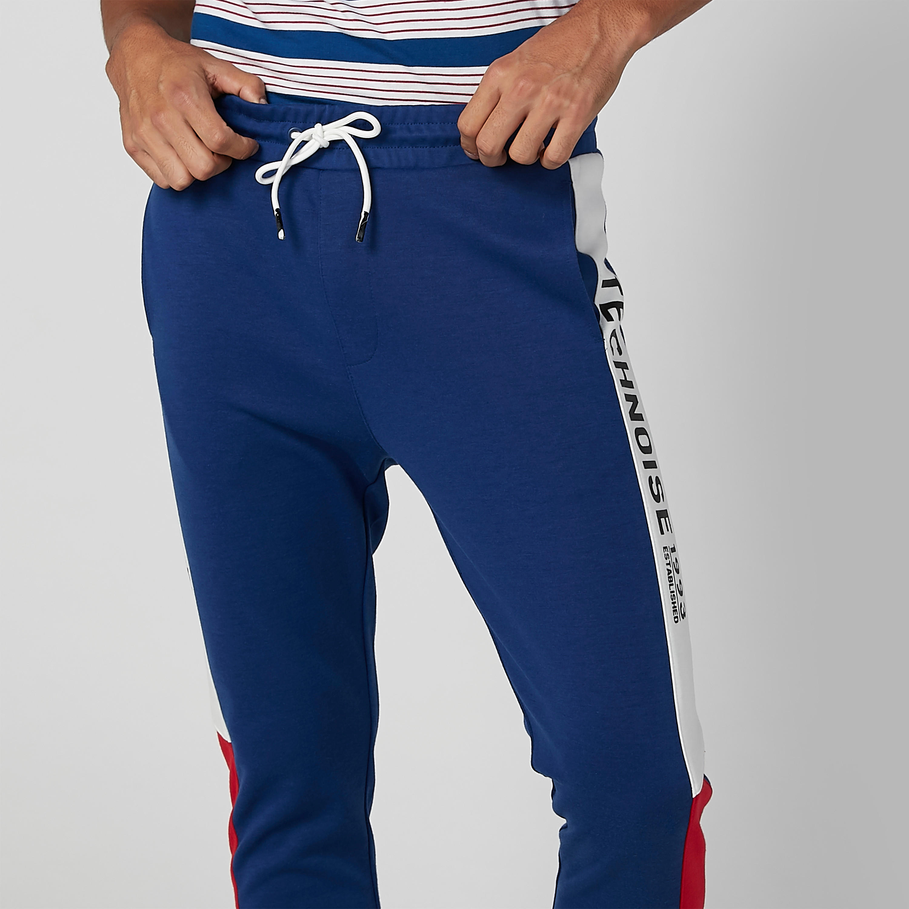 بنطال رياضي بأساور مطّاطية ورباط وجيوب وطبعات-men-clothing-bottoms-joggers-image-4