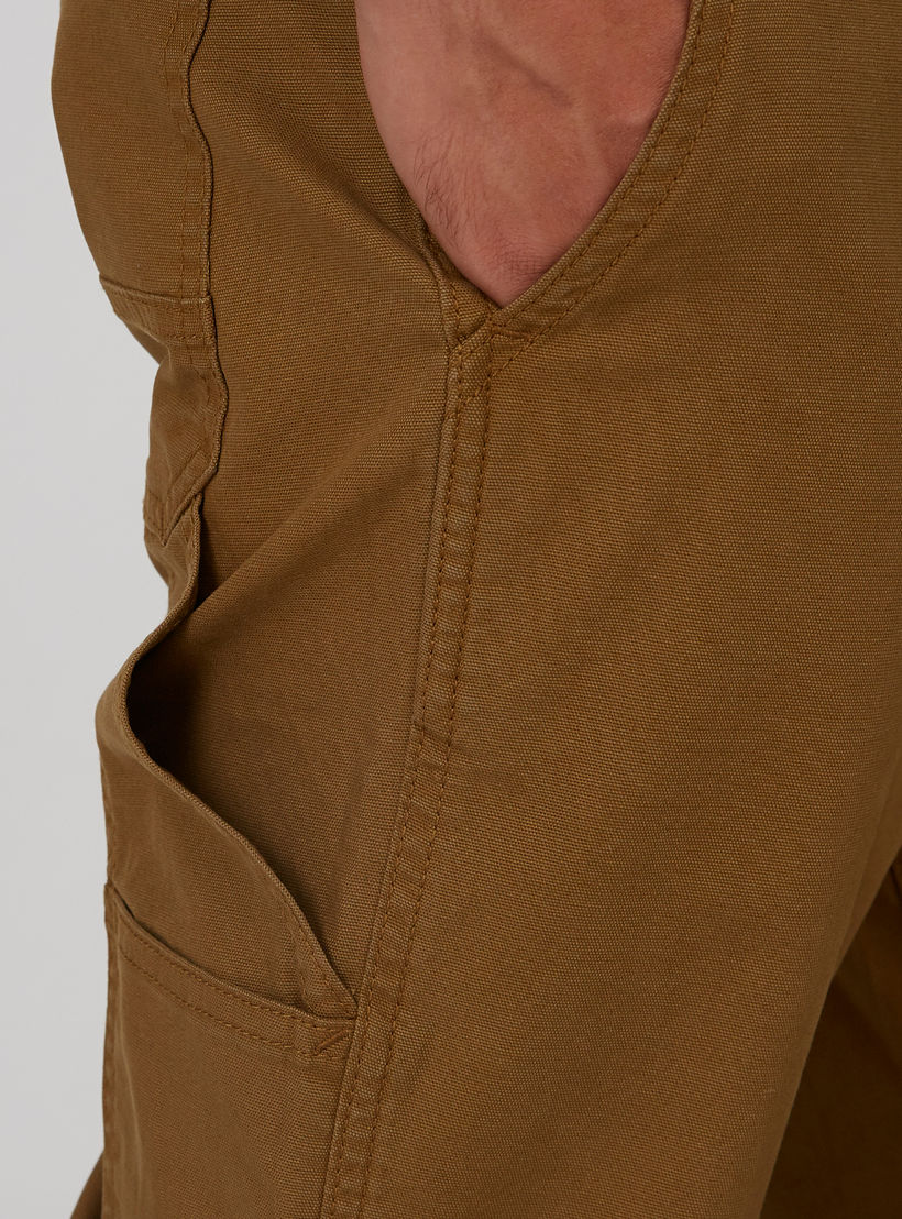 بنطلون قصير سكيني سادة بخصر منخفض وجيوب-men-clothing-bottoms-trousersandchinos-trousers-image-4