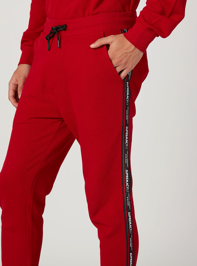 بنطلون رياضي سادة طويل بخصر مطاطي وشريطة-men-clothing-bottoms-joggers-image-3