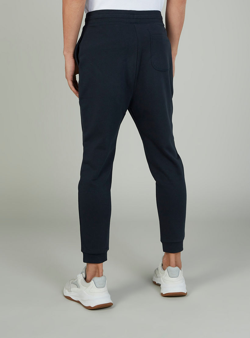 بنطلون رياضي بارز الملمس بخصر مطّاطي وجيوب-men-clothing-bottoms-joggers-image-4