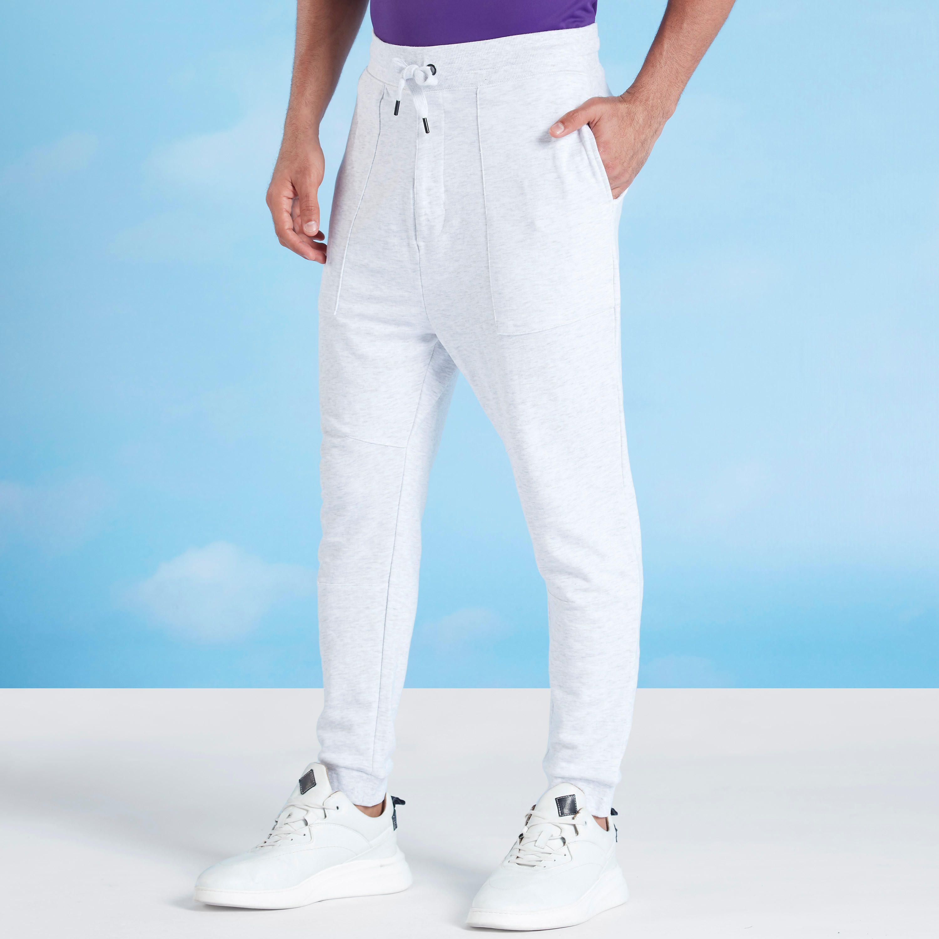 بنطلون رياضي بارز الملمس بخصر مطّاطي وجيوب-men-clothing-bottoms-joggers-image-1