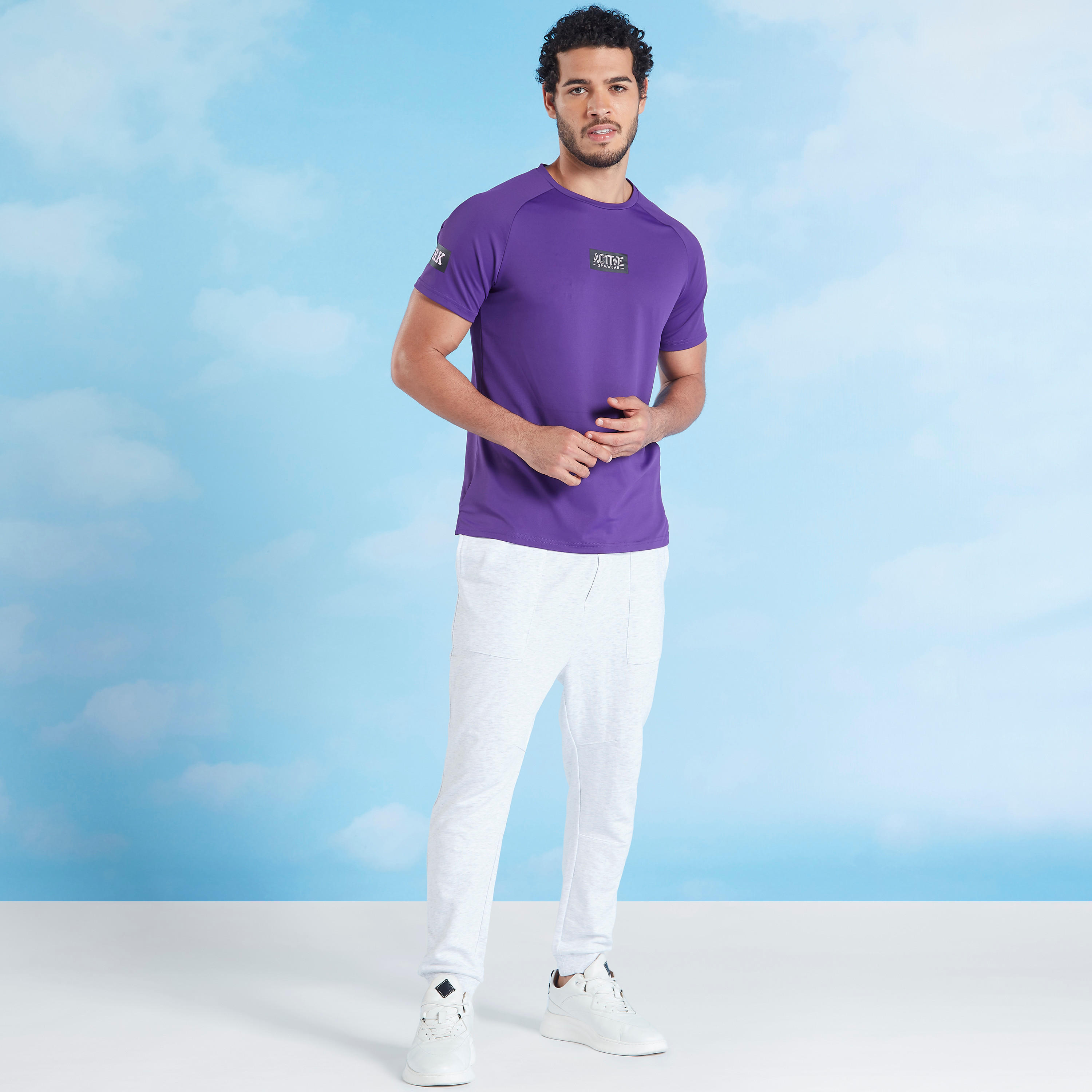 بنطلون رياضي بارز الملمس بخصر مطّاطي وجيوب-men-clothing-bottoms-joggers-image-2