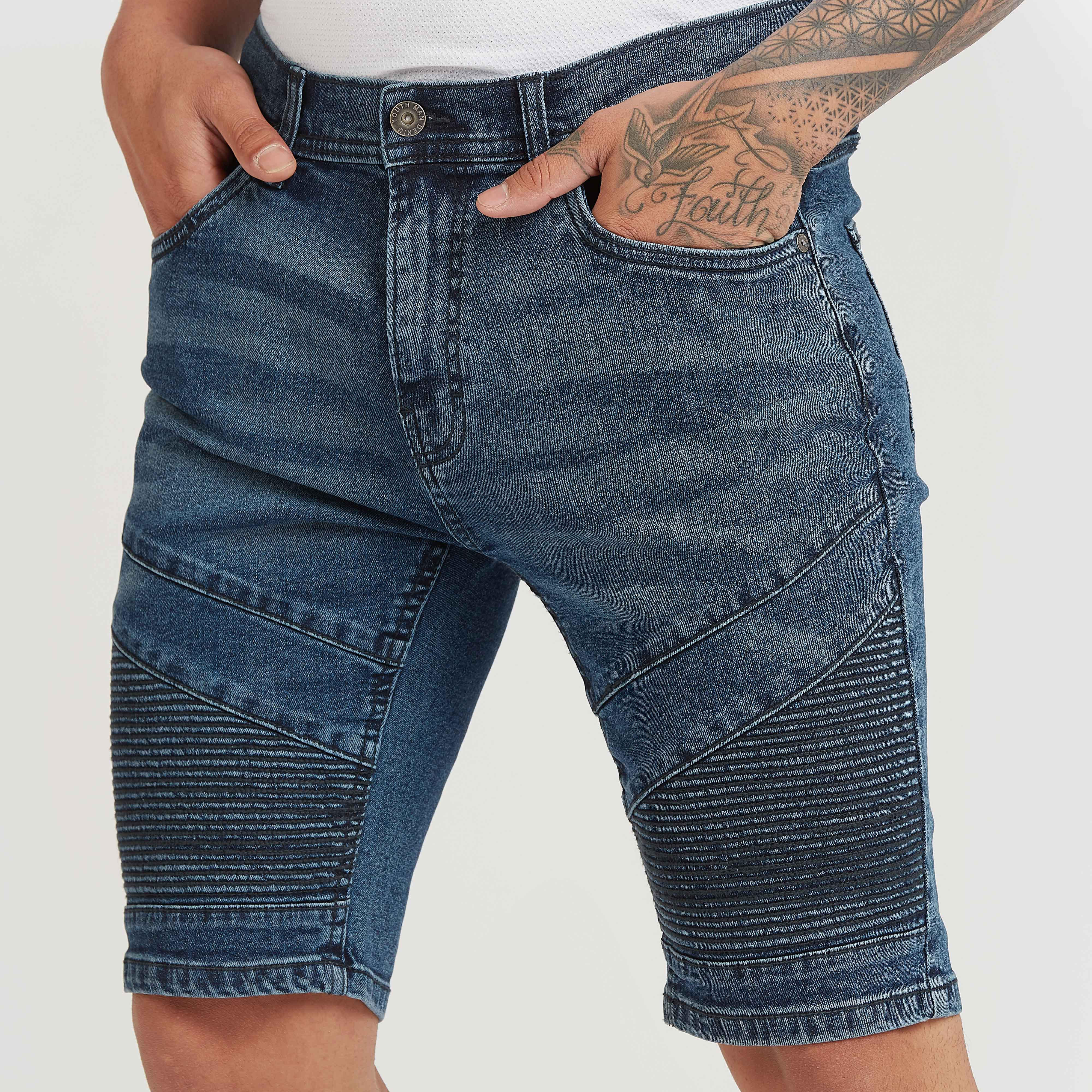 شورت بارز الملمس بخصر متوسط الارتفاع وجيوب وعراوي-men-clothing-bottoms-shorts-image-3