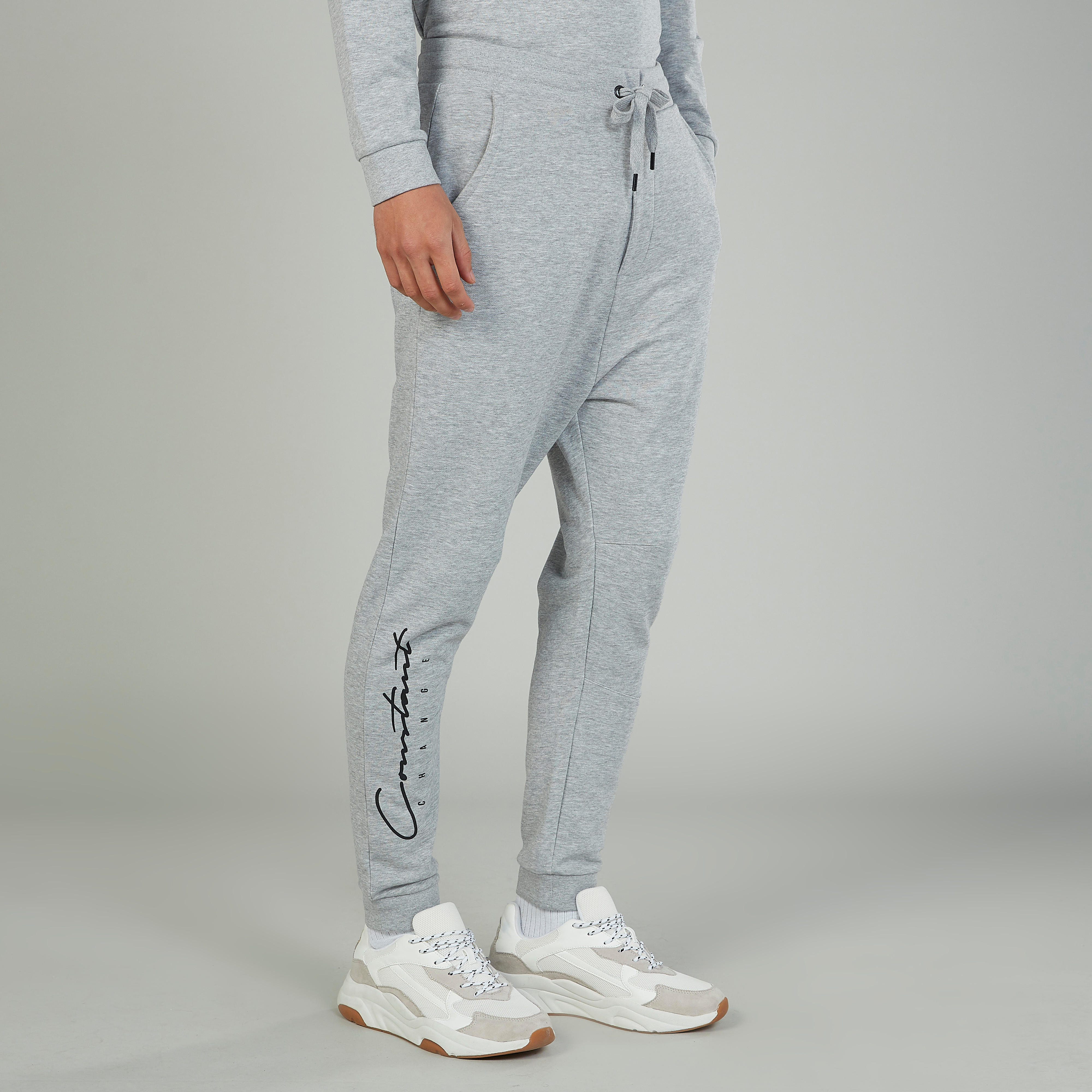 بنطلون رياضي سكيني بخصر متوسط الارتفاع وجيوب وطبعات-men-clothing-bottoms-joggers-image-5