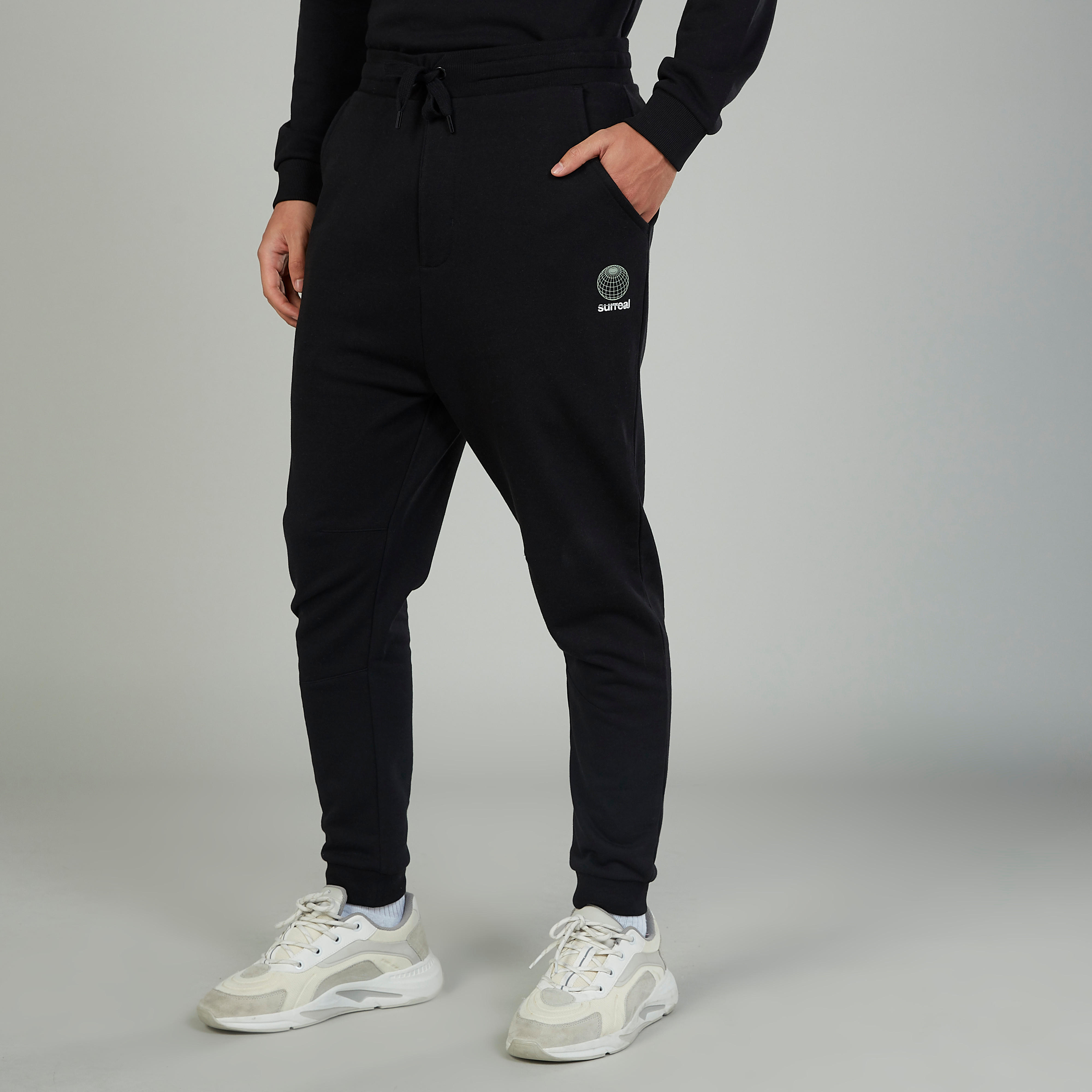 بنطلون رياضي سكيني بخصر متوسط الارتفاع وجيوب وطبعات-men-clothing-bottoms-joggers-image-5