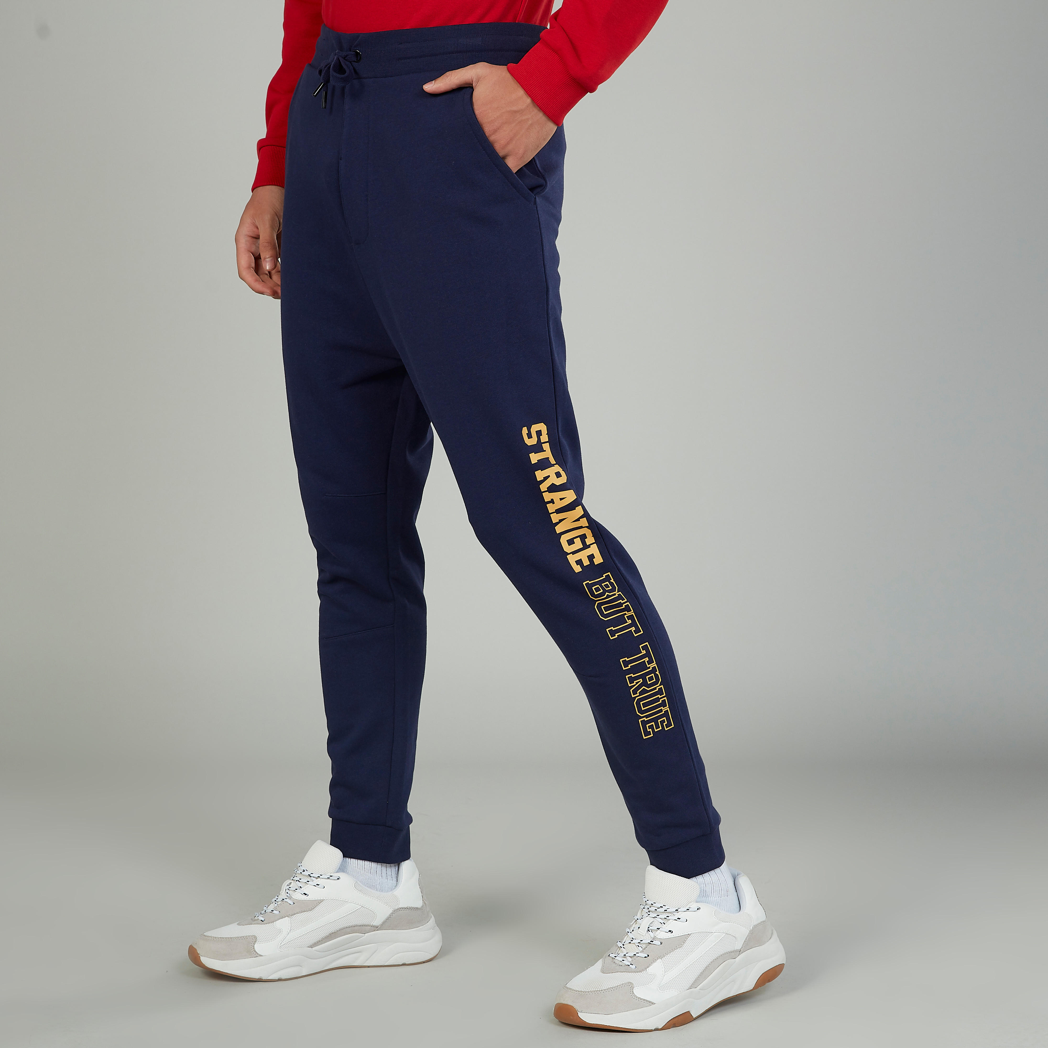 بنطلون رياضي سكيني بخصر متوسط الارتفاع وجيوب وطبعات-men-clothing-bottoms-joggers-image-5