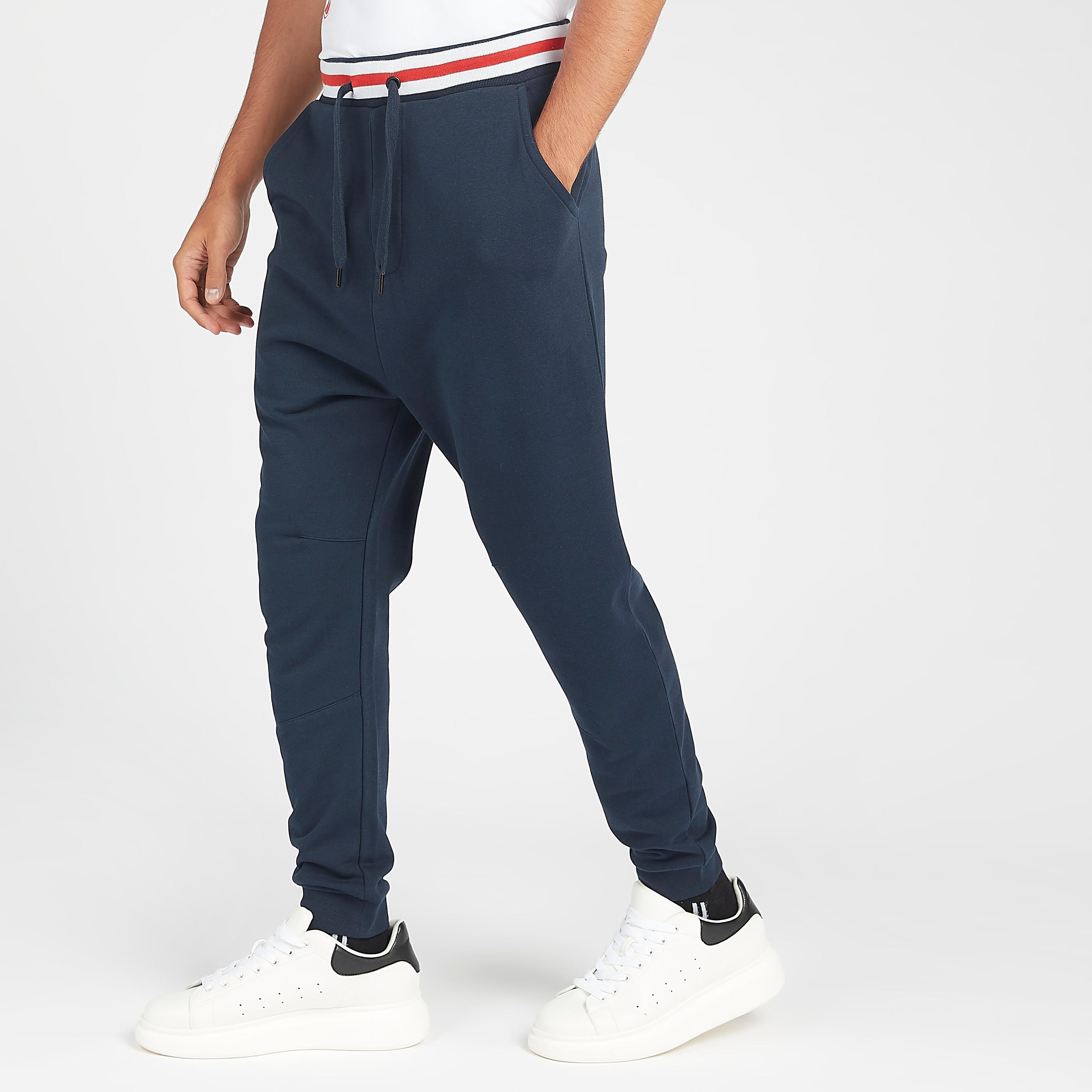 بنطلون رياضي بارز الملمس برباط إغلاق وجيوب-men-clothing-bottoms-joggers-image-5