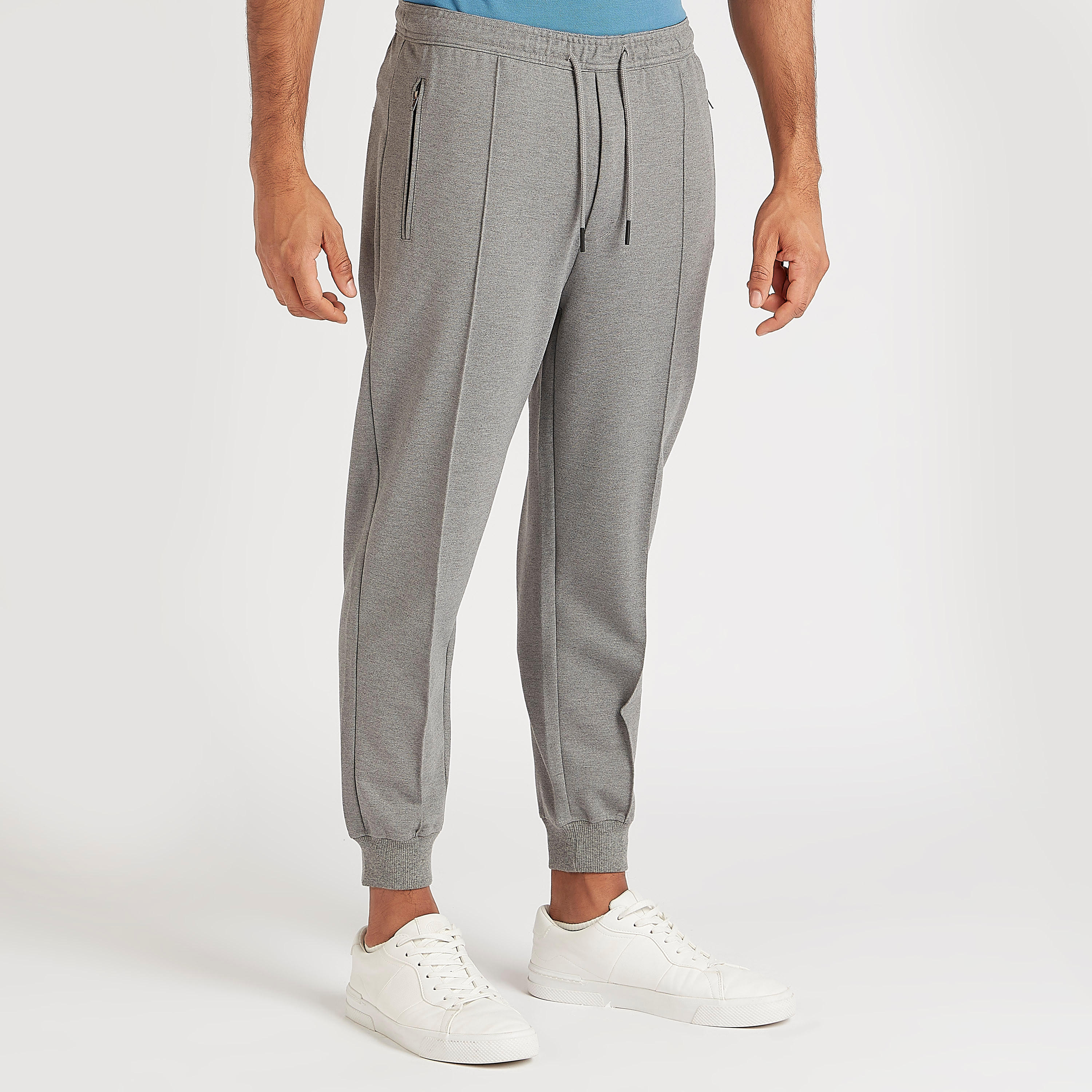 Solid Mid-Rise Jog Pants with Elasticated Waist and Zipper Pockets-men-clothing-bottoms-joggers-image-1