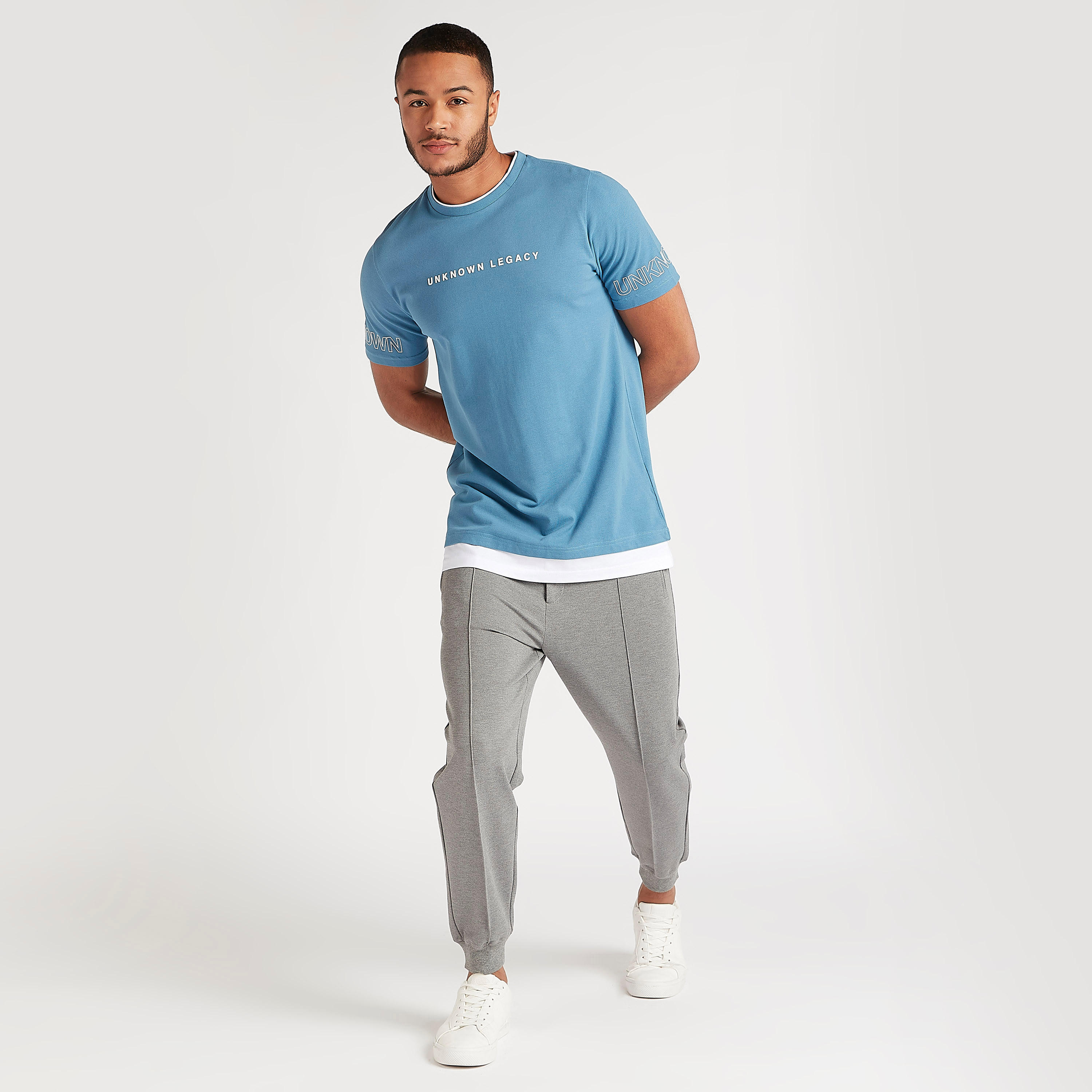 Solid Mid-Rise Jog Pants with Elasticated Waist and Zipper Pockets-men-clothing-bottoms-joggers-image-2