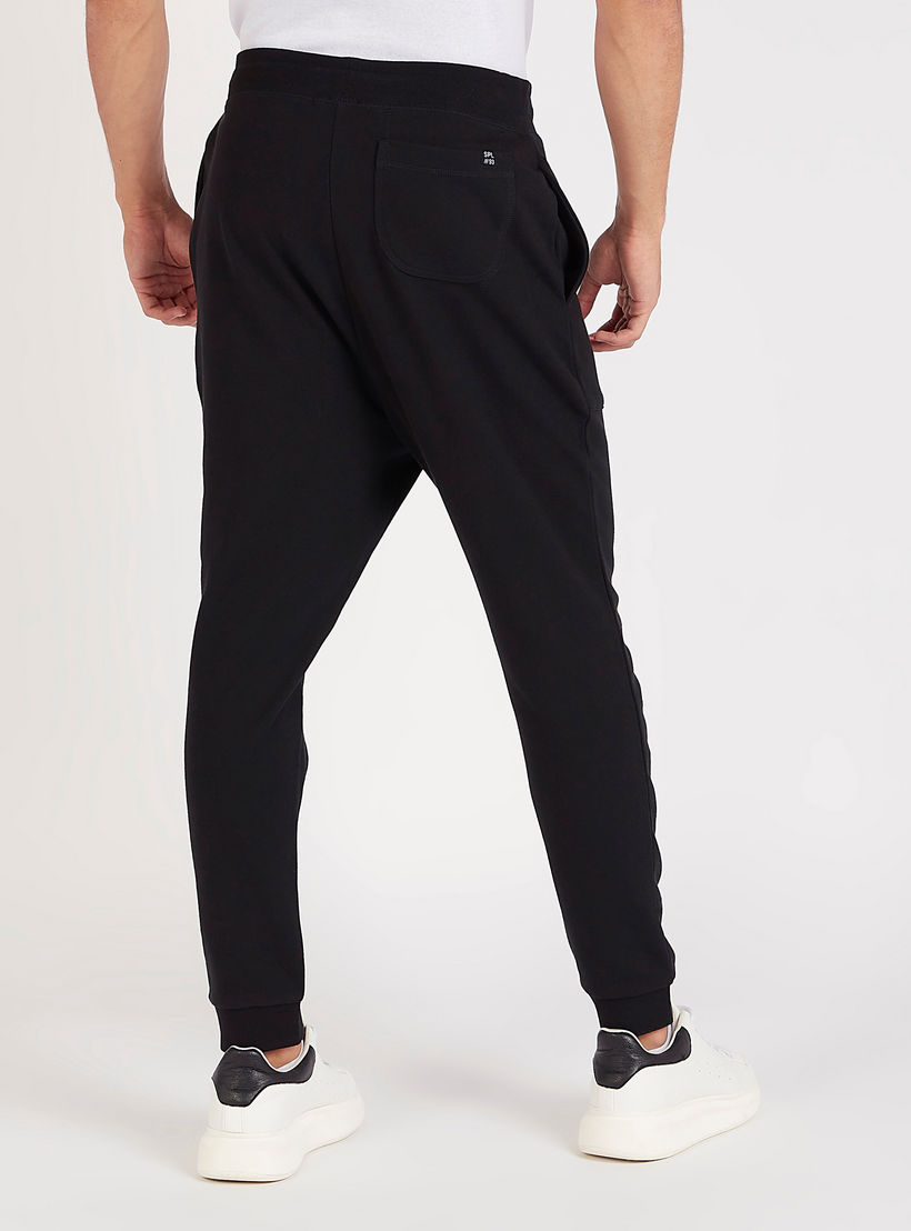 بنطلون رياضي برباط إغلاق وخصر متوسّط الارتفاع-men-clothing-bottoms-joggers-image-2