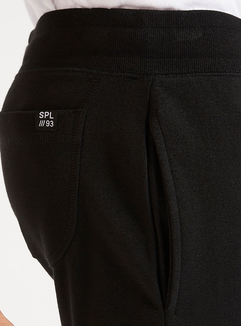 بنطلون رياضي برباط إغلاق وخصر متوسّط الارتفاع-men-clothing-bottoms-joggers-image-1