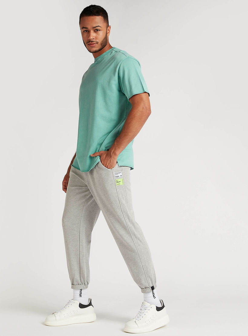 بنطلون رياضي سادة برباط إغلاق وخصر متوسّط الارتفاع-men-clothing-bottoms-joggers-image-5