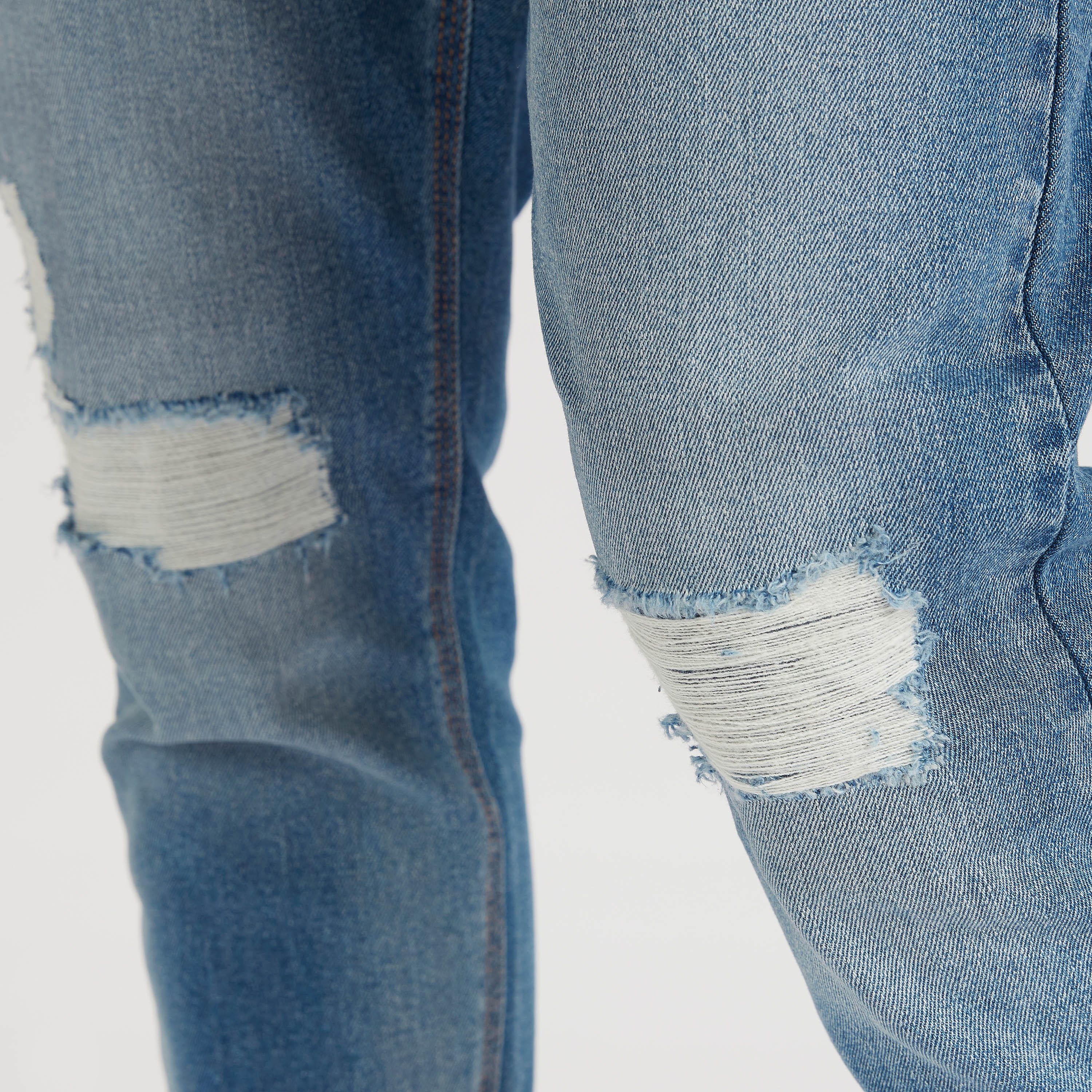 بنطلون جينز  مضلّع بخصر متوسط الارتفاع وزر إغلاق-men-clothing-bottoms-jeans-image-5