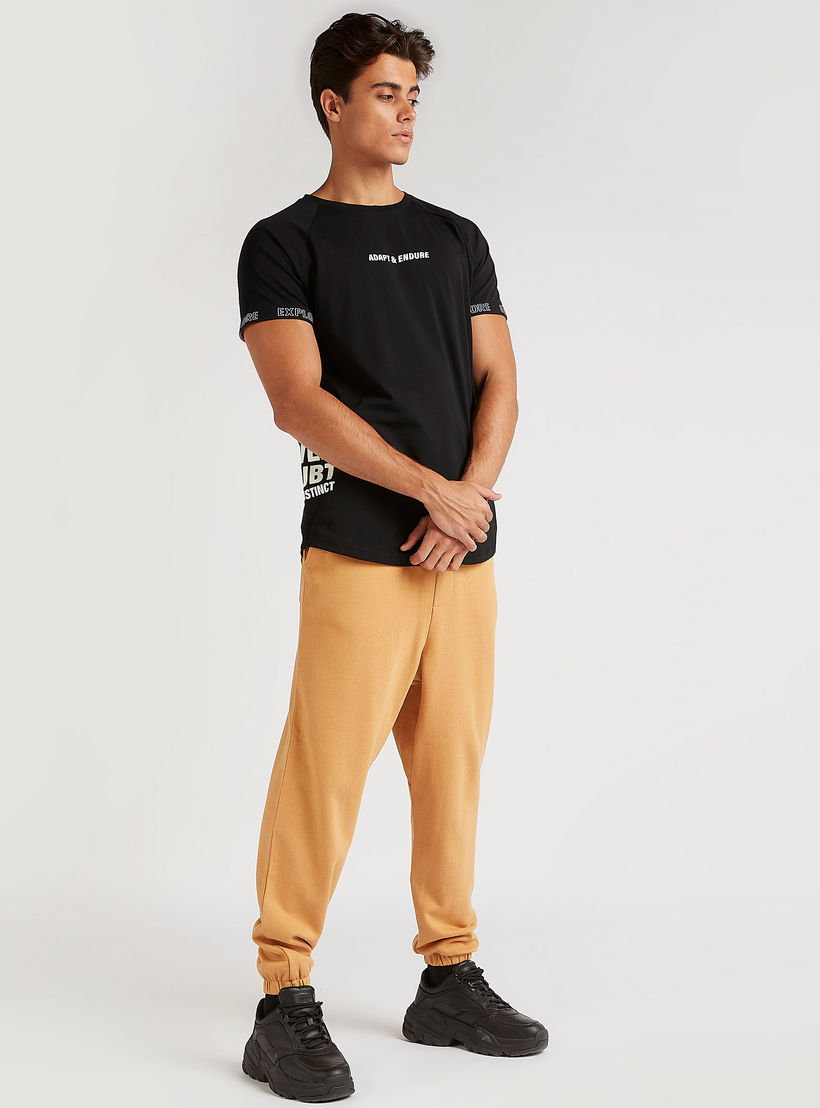 Solid Mid-Rise Joggers with Elasticated Waistband-men-clothing-bottoms-joggers-image-2