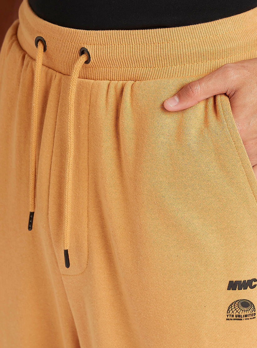Solid Mid-Rise Joggers with Elasticated Waistband-men-clothing-bottoms-joggers-image-3