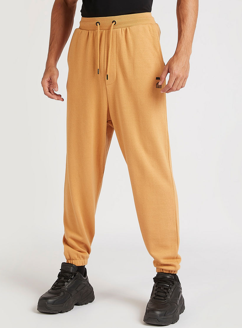 Solid Mid-Rise Joggers with Elasticated Waistband-men-clothing-bottoms-joggers-image-5
