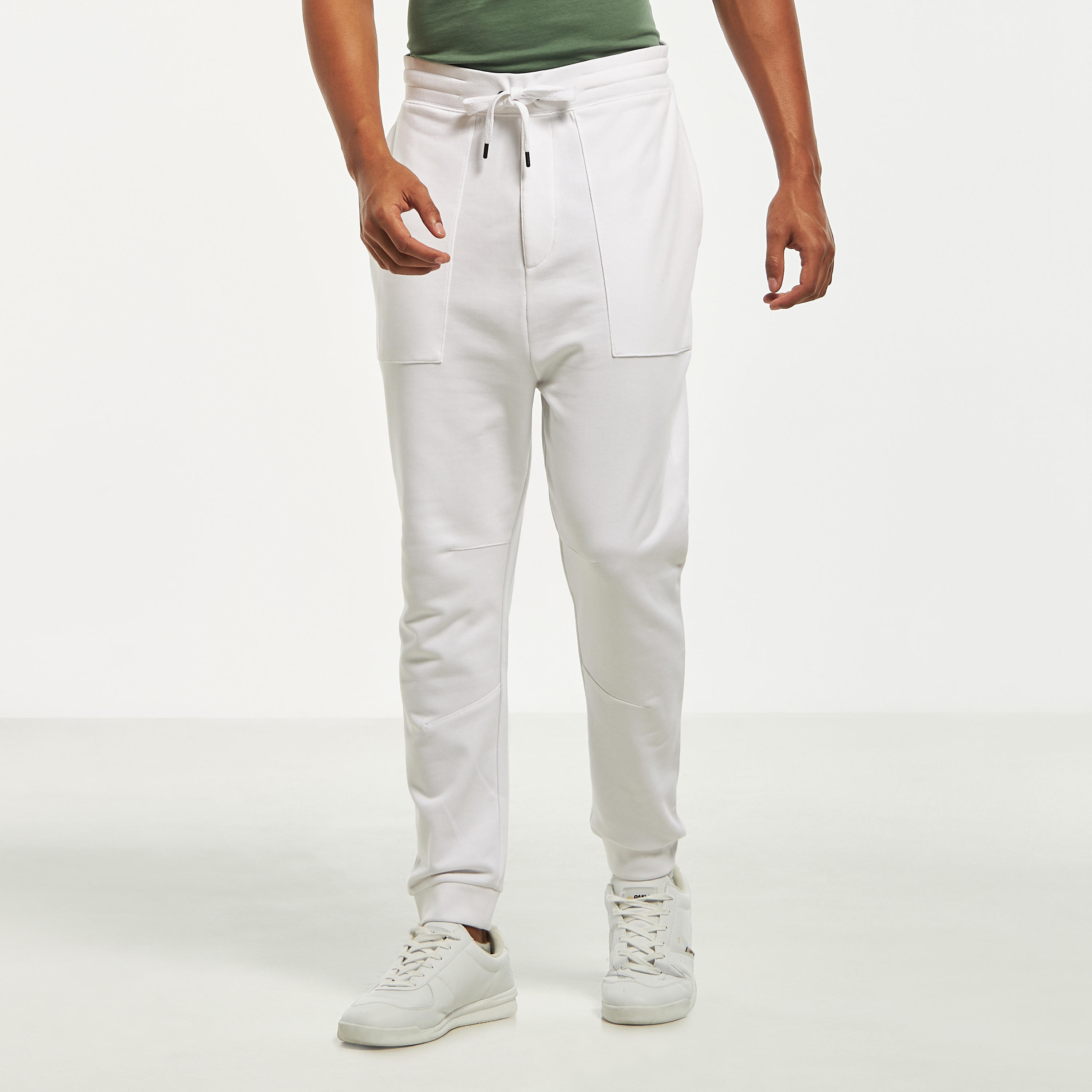 بنطلون رياضي سادة بخصر مطاطي وجيوب فضفاض-men-clothing-bottoms-joggers-image-5