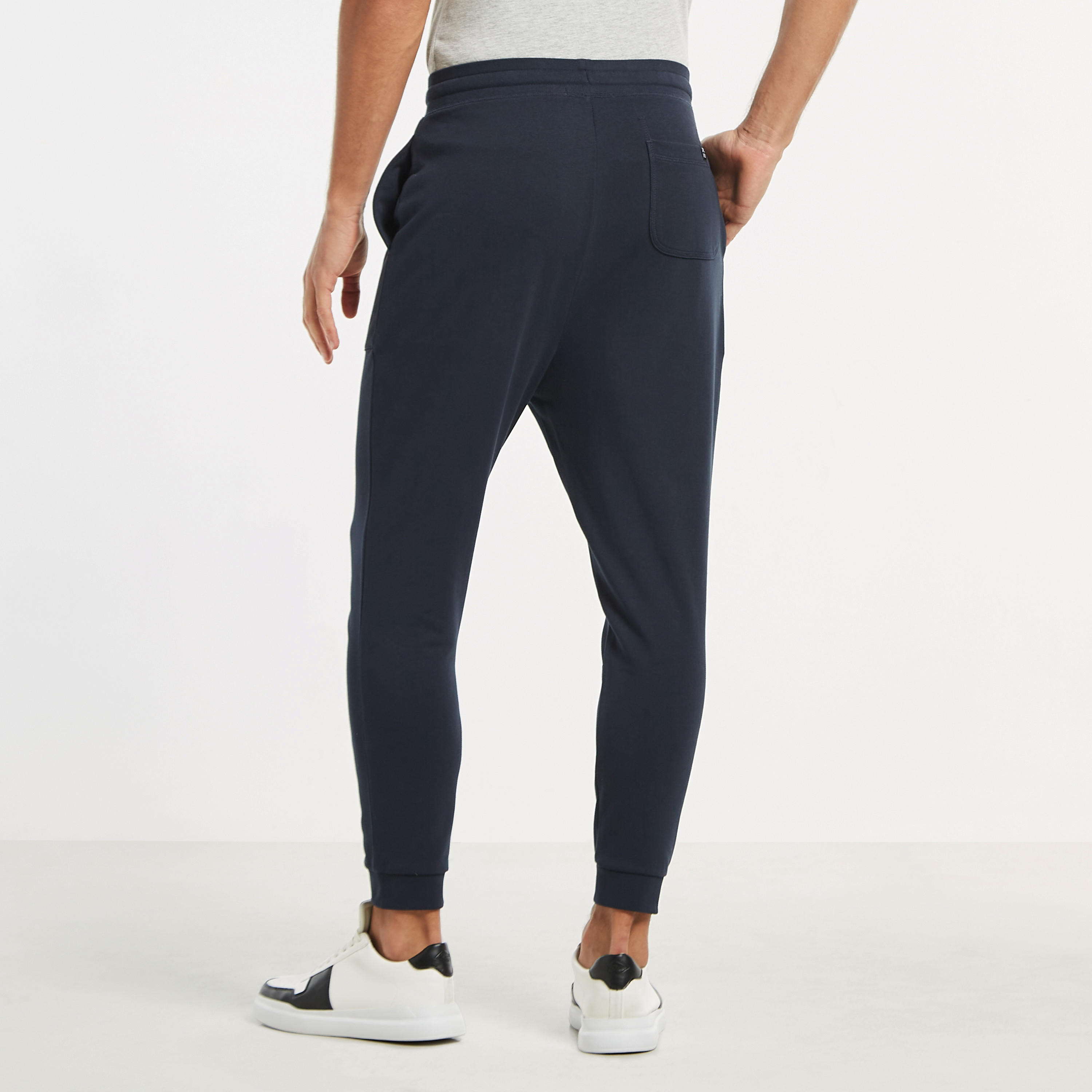 بنطلون رياضي سادة بخصر مطاطي وجيوب فضفاض-men-clothing-bottoms-joggers-image-15