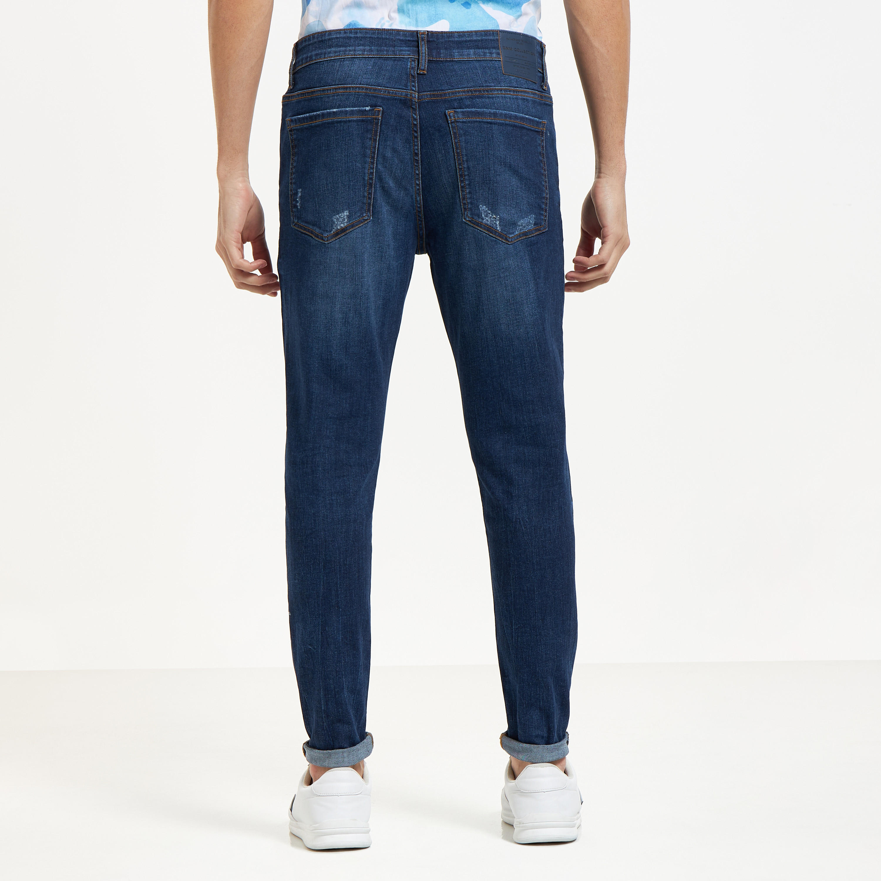 بنطلون جينز بقصة سكيني مضلع بزر إغلاق وجيوب-men-clothing-jeans-image-11