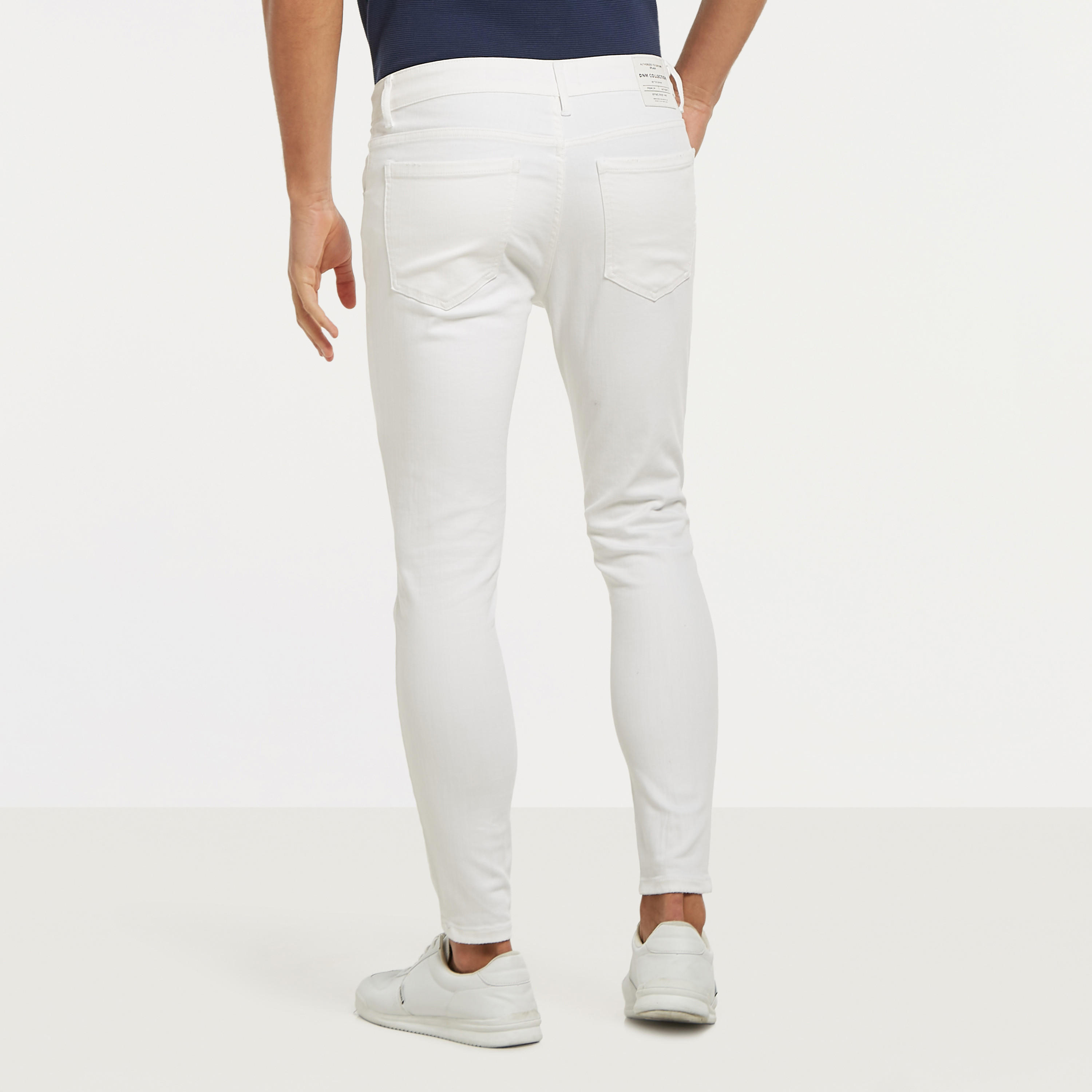 بنطلون جينز بقصة سكيني مضلع بزر إغلاق وجيوب-men-clothing-jeans-image-19
