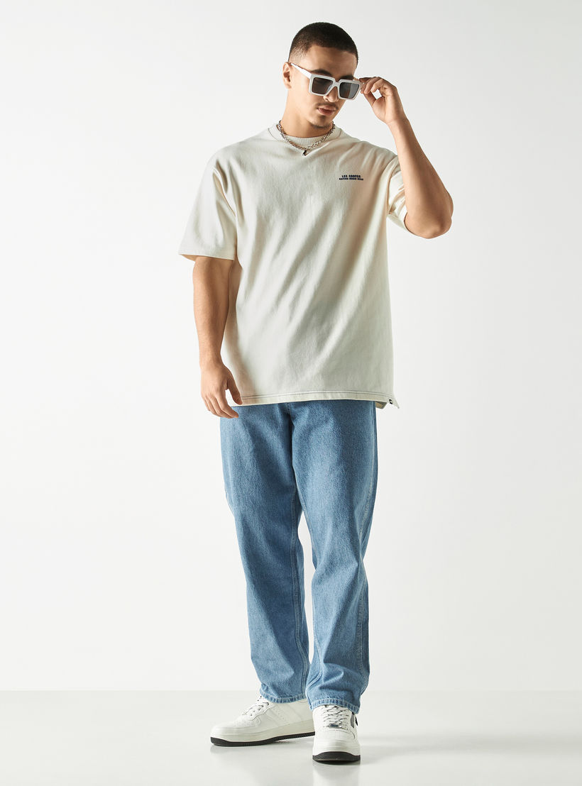 بنطلون جينز سادة بجيوب وزر إغلاق من ستارتر-men-clothing-bottoms-jeans-image-3
