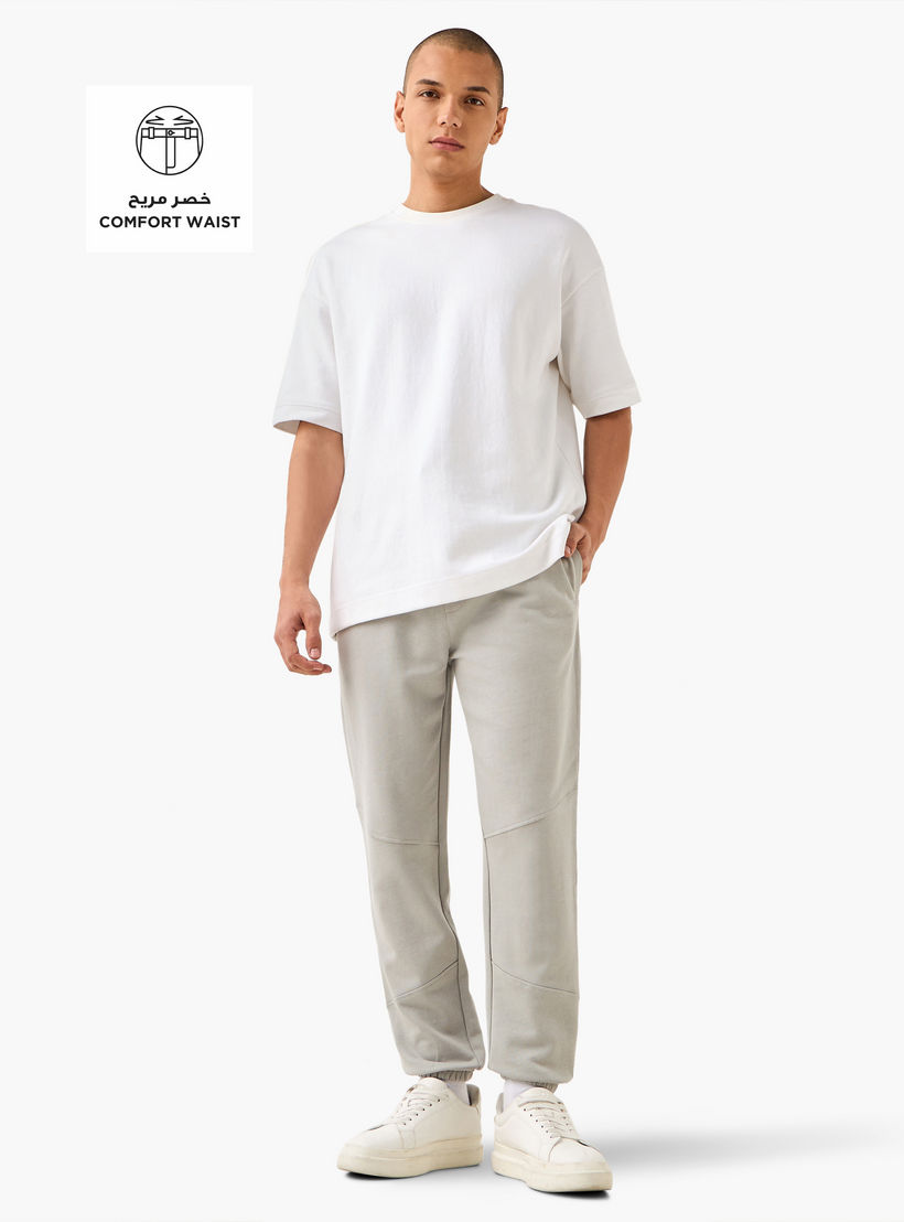 بنطلون رياضي بخصر مرن وتصميم بألواح وجيوب-men-clothing-bottoms-joggers-image-2