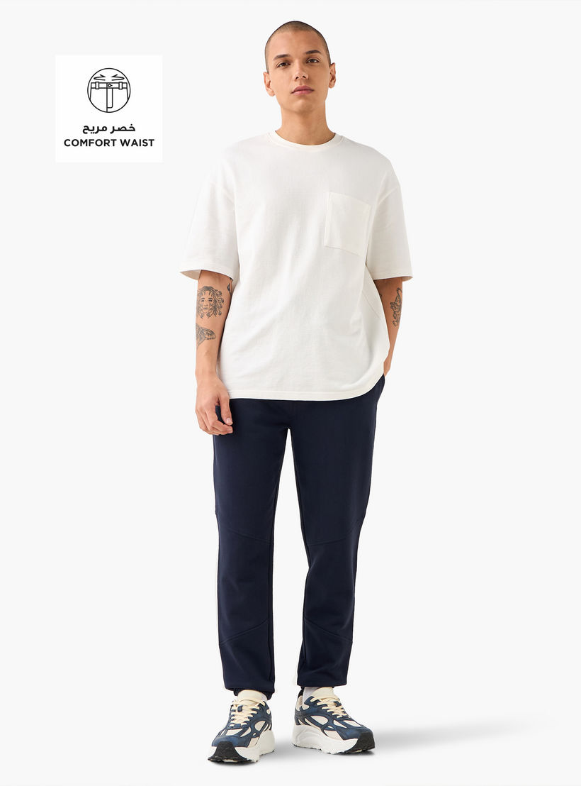 بنطلون رياضي بخصر مرن وتصميم بألواح وجيوب-men-clothing-bottoms-joggers-image-2