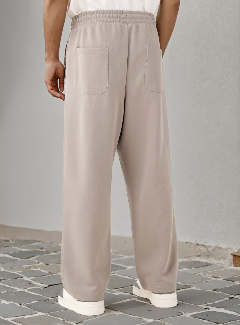 بنطلون رياضي محبوك مترابط بخصر مرن وجيوب-men-clothing-bottoms-joggers-image-3