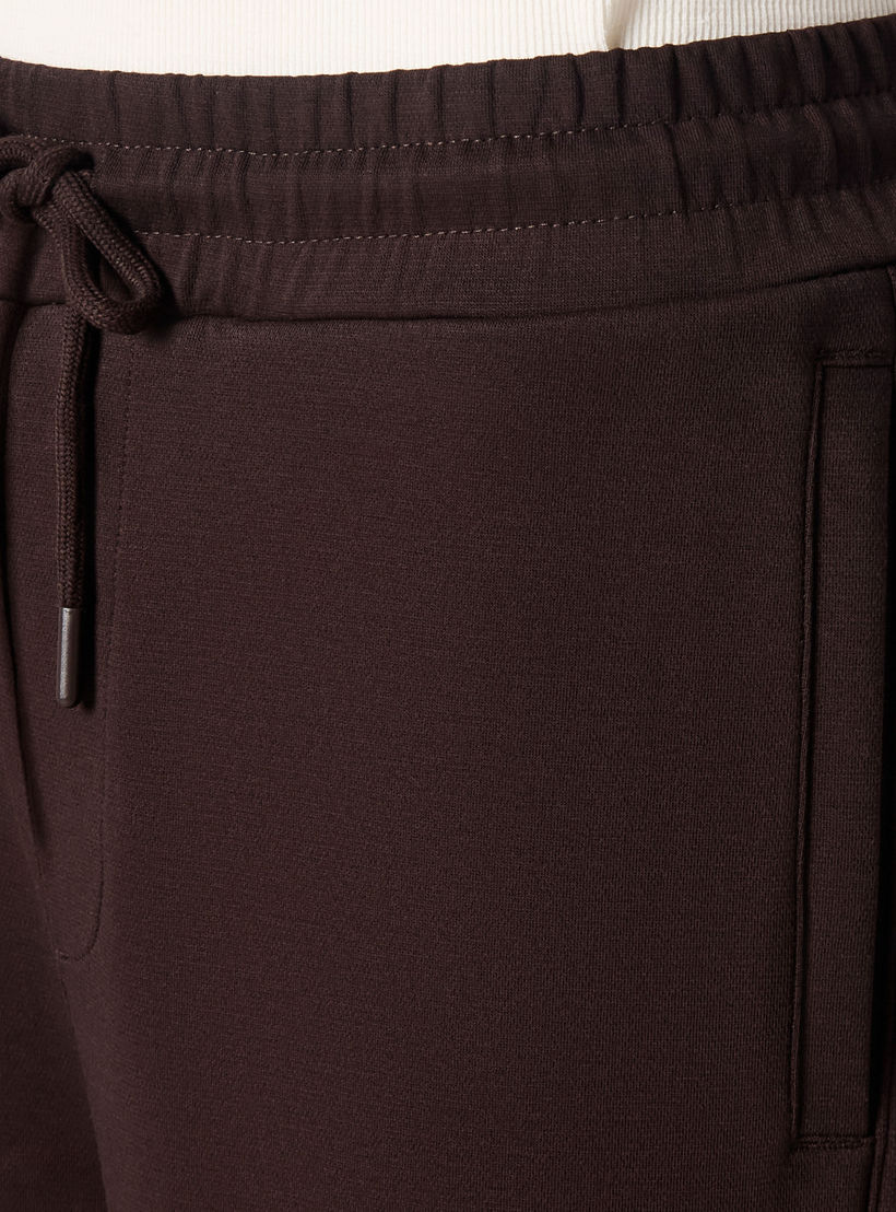 Men Relaxed Fit Interlock Joggers-men-clothing-bottoms-joggers-image-2